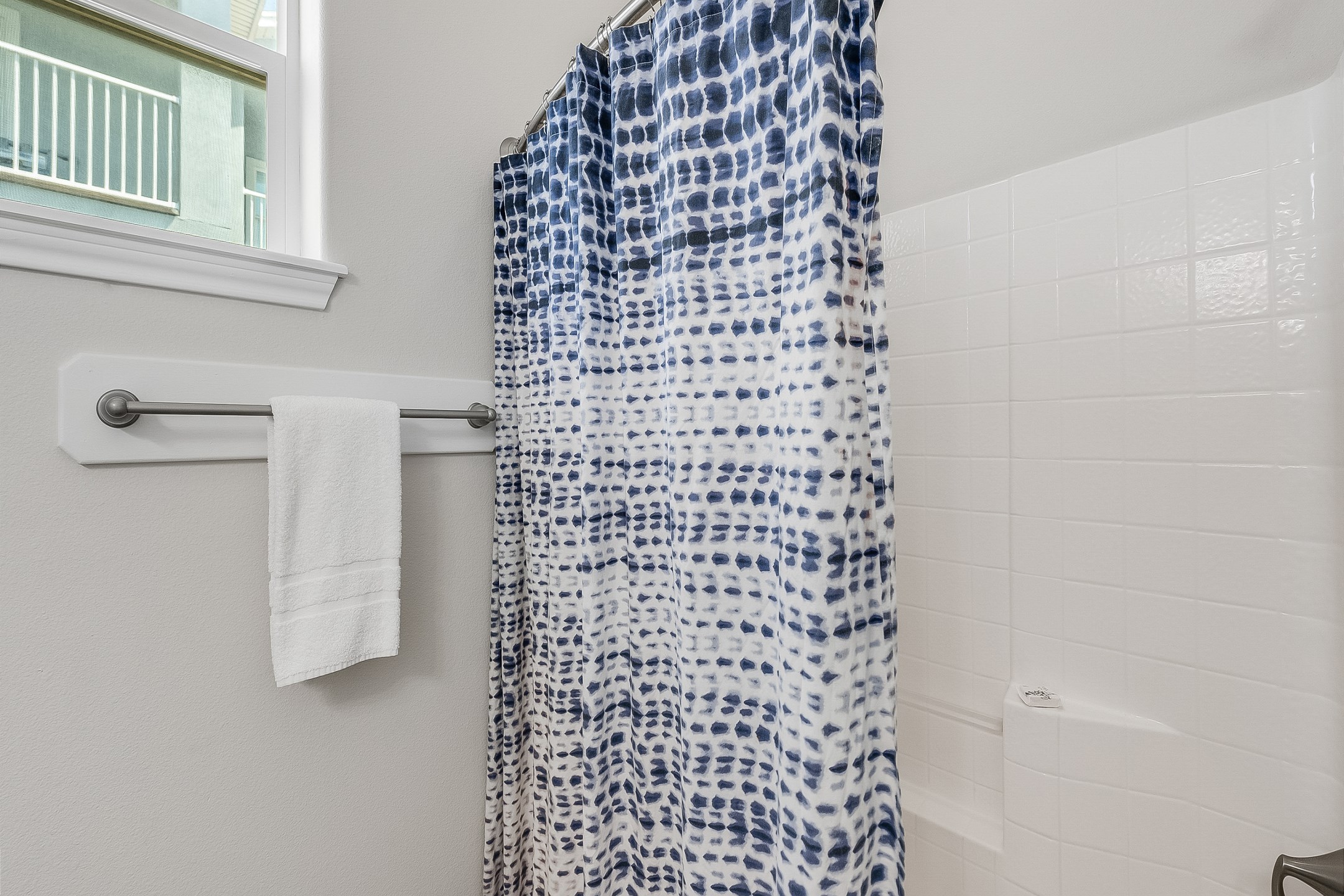 Guest bathroom on the second floor with tub and shower 