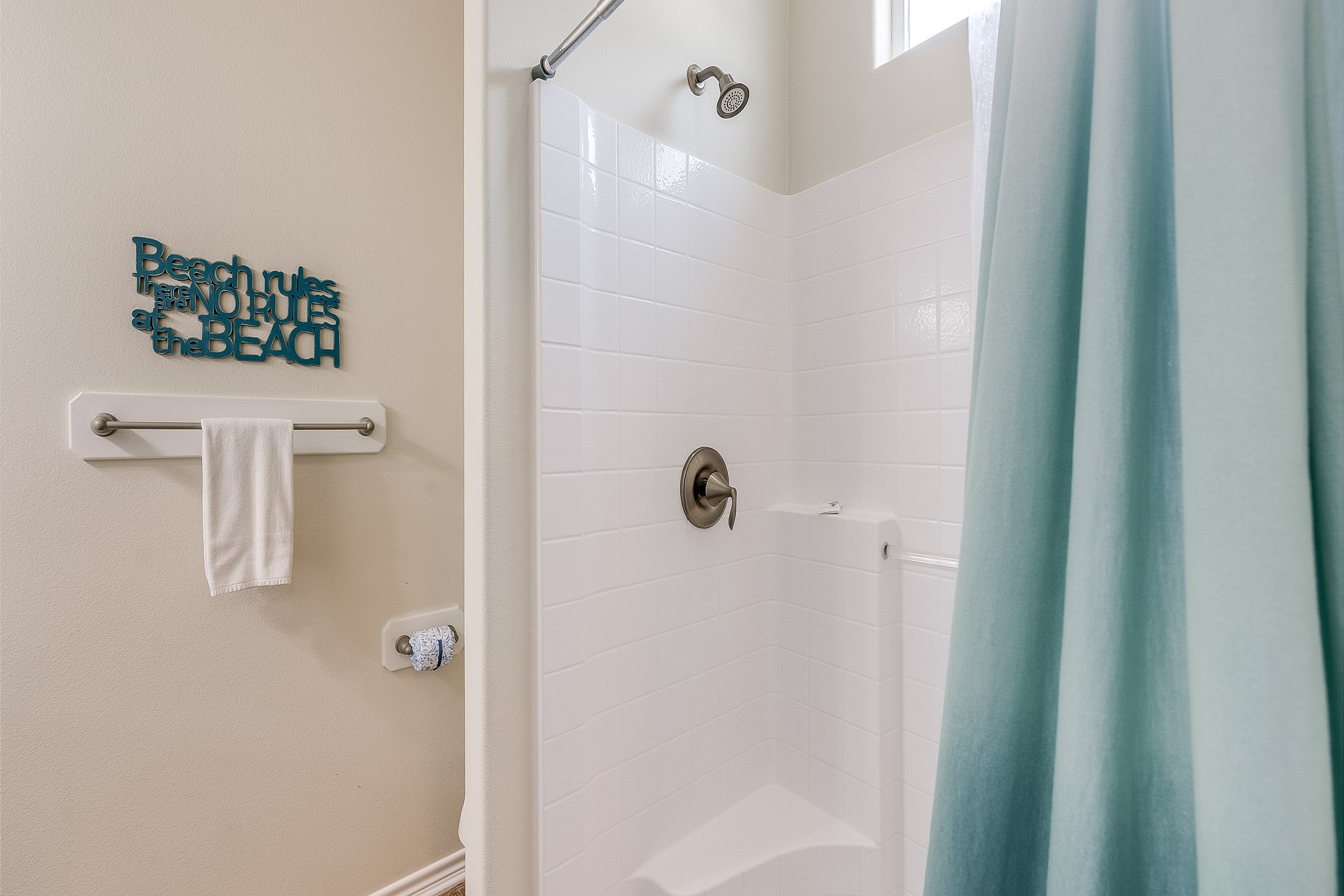 Master bathroom on the first floor with walk in shower 
