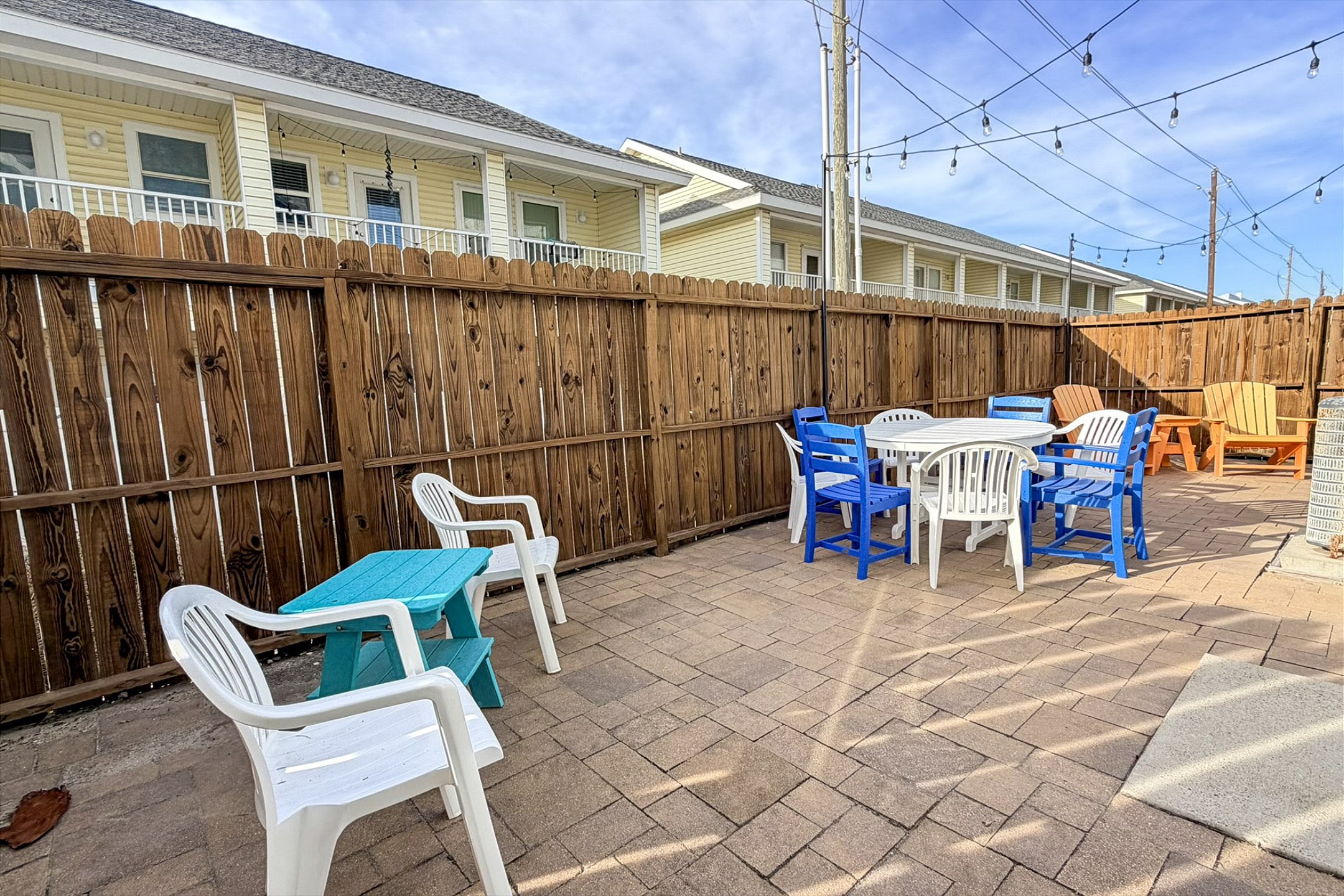Charming patio space is calling your name - time to choose your next vacation and chill out with the family 