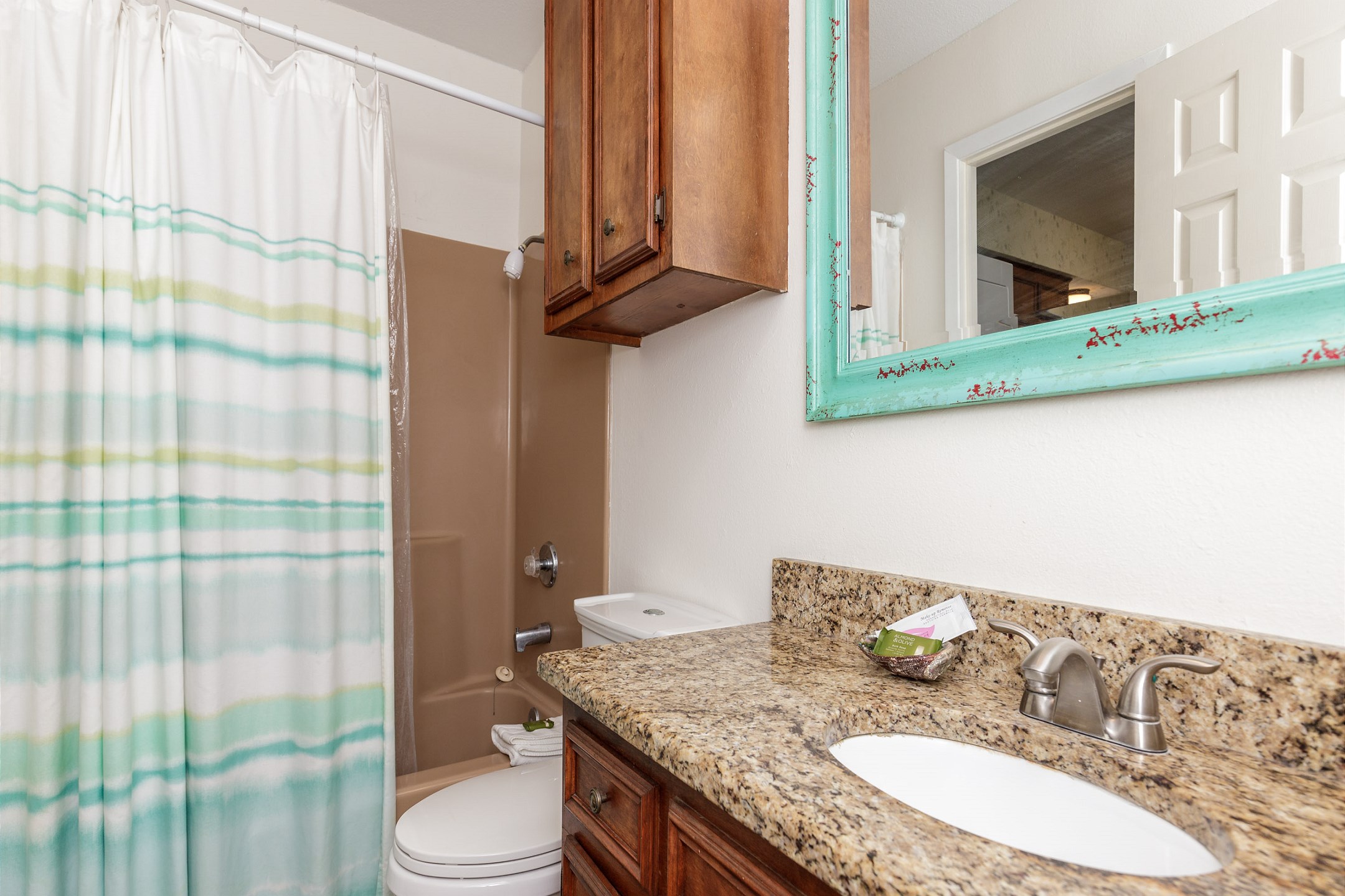 Guest bathroom on the first floor with tub and shower