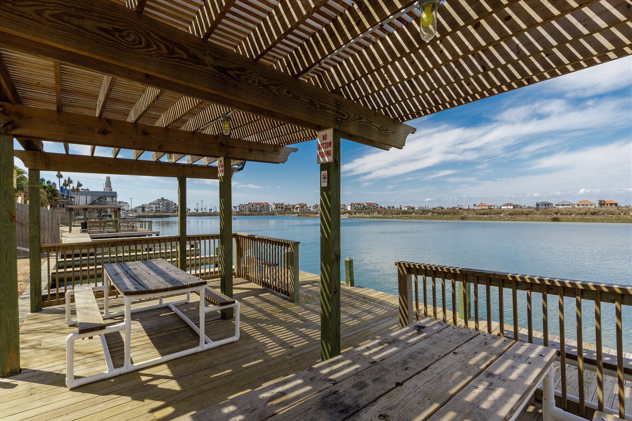 Relax on the covered deck, feel the Texas breeze, and enjoy easy access to the fishing dock