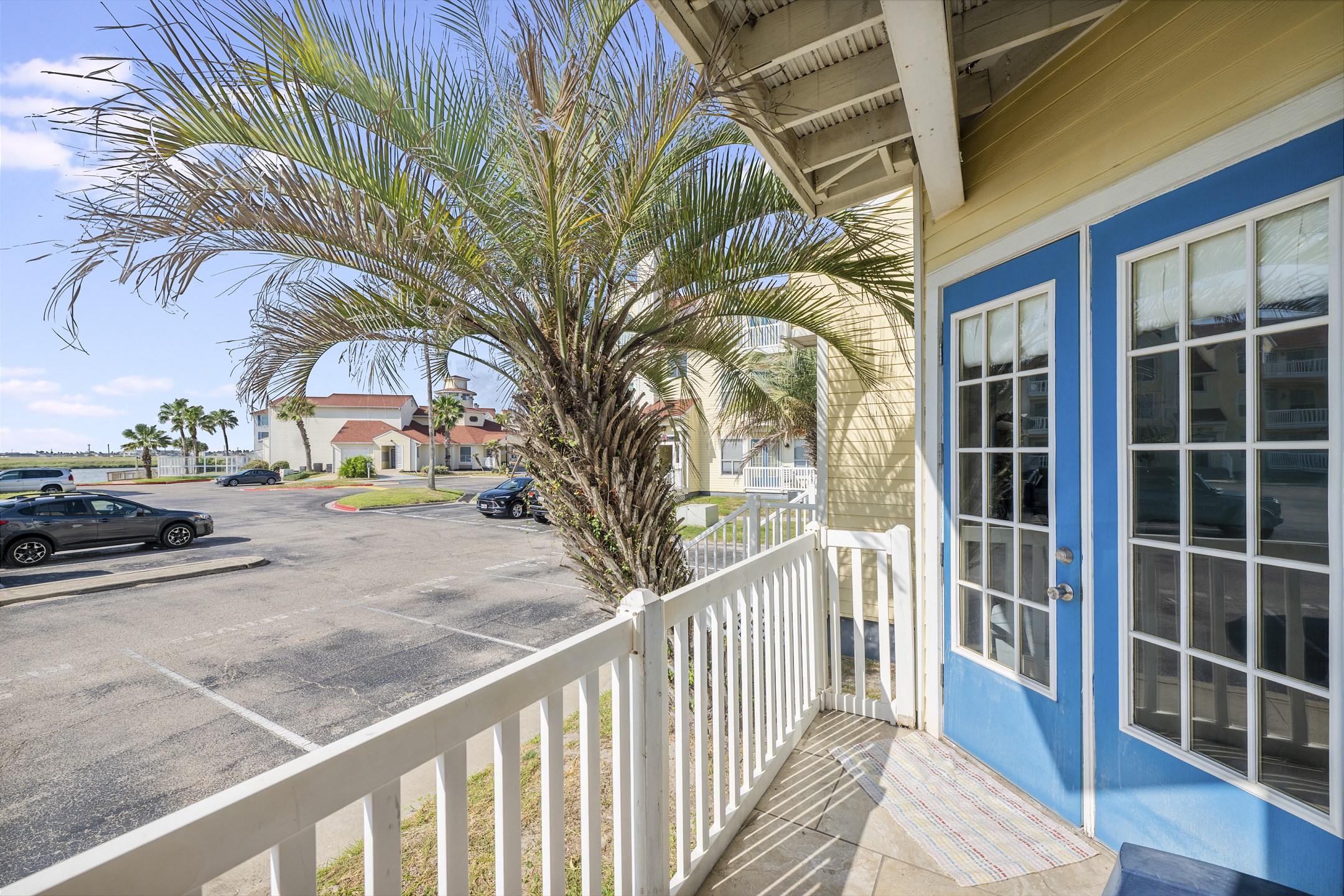 Scenic balcony seating to unwind after a day at the beach