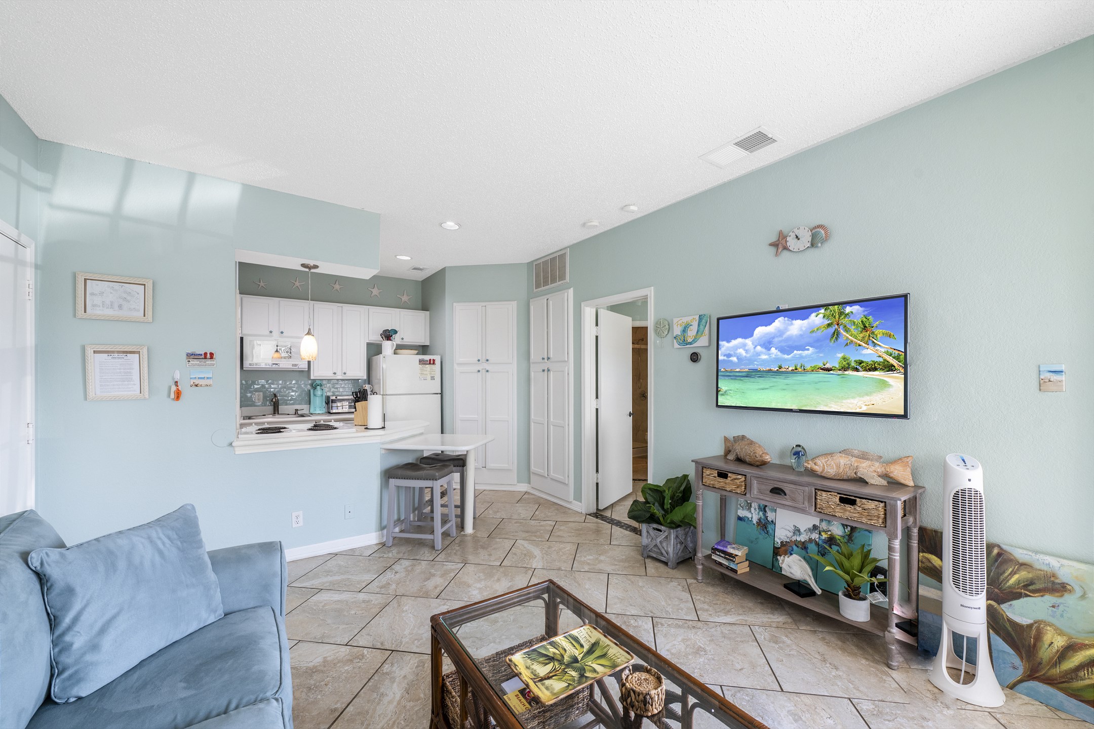 Spacious family lounge with connected dining area and fully equipped kitchen