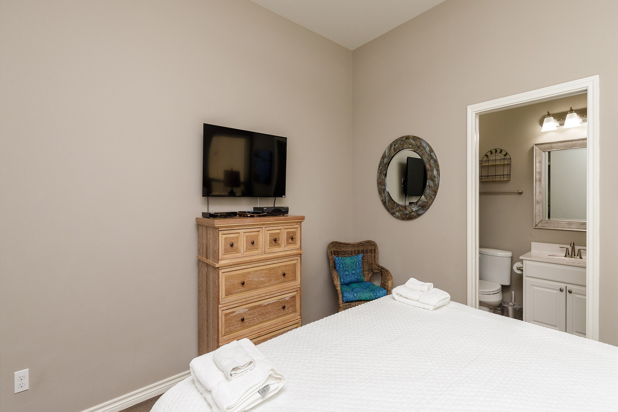 Master bedroom with king size bed and private bathroom 