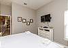 Master bedroom with flat screen TV