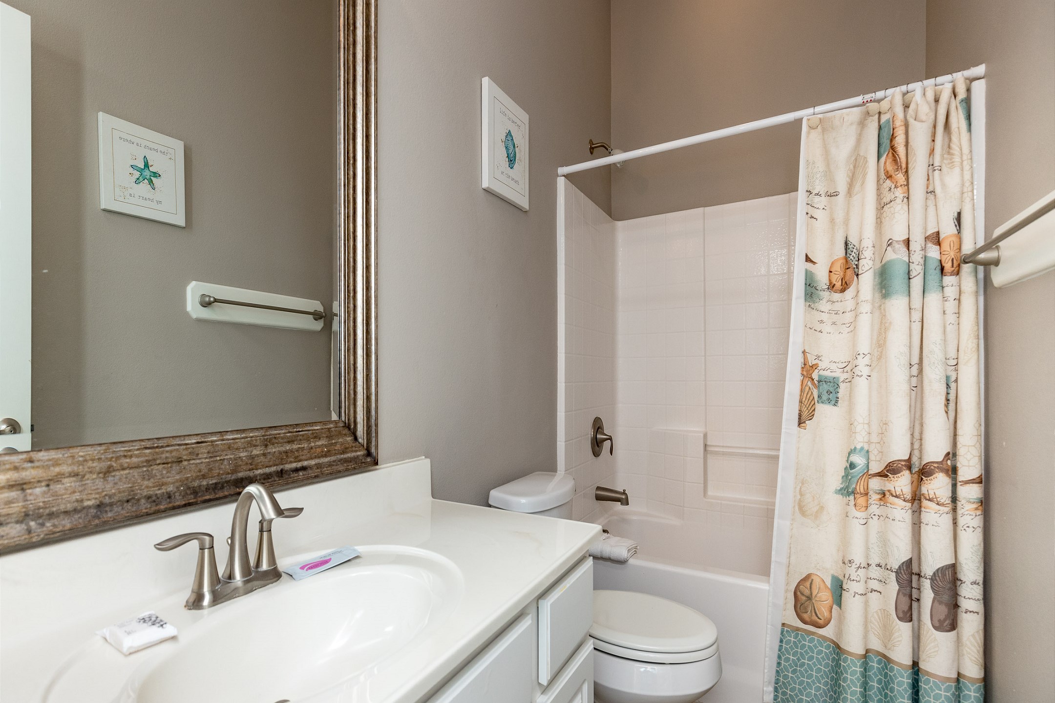Guest bathroom with tub and shower
