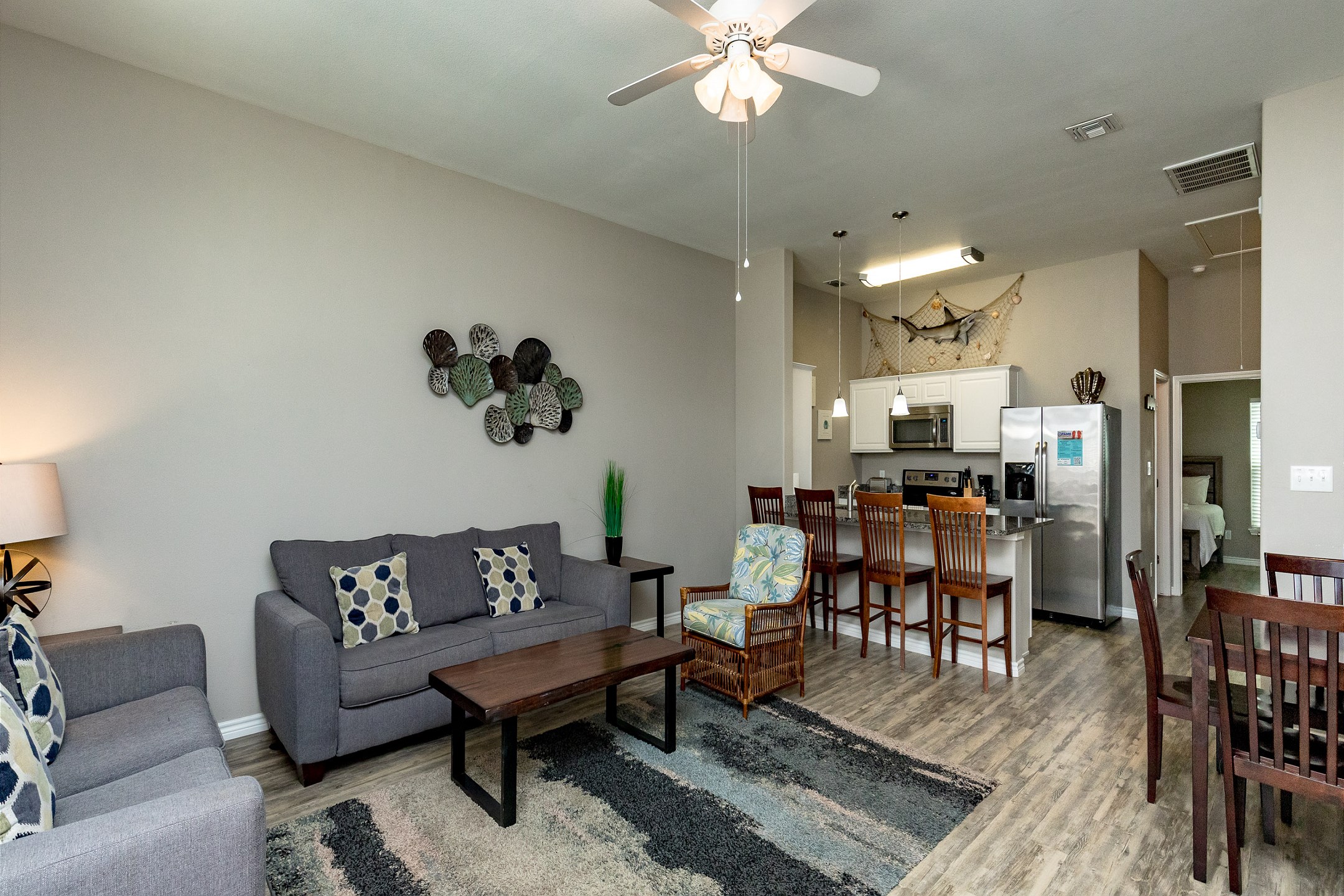 Inviting family hub with seamlessly integrated kitchen, dining, and living areas, perfect for creating lasting memories