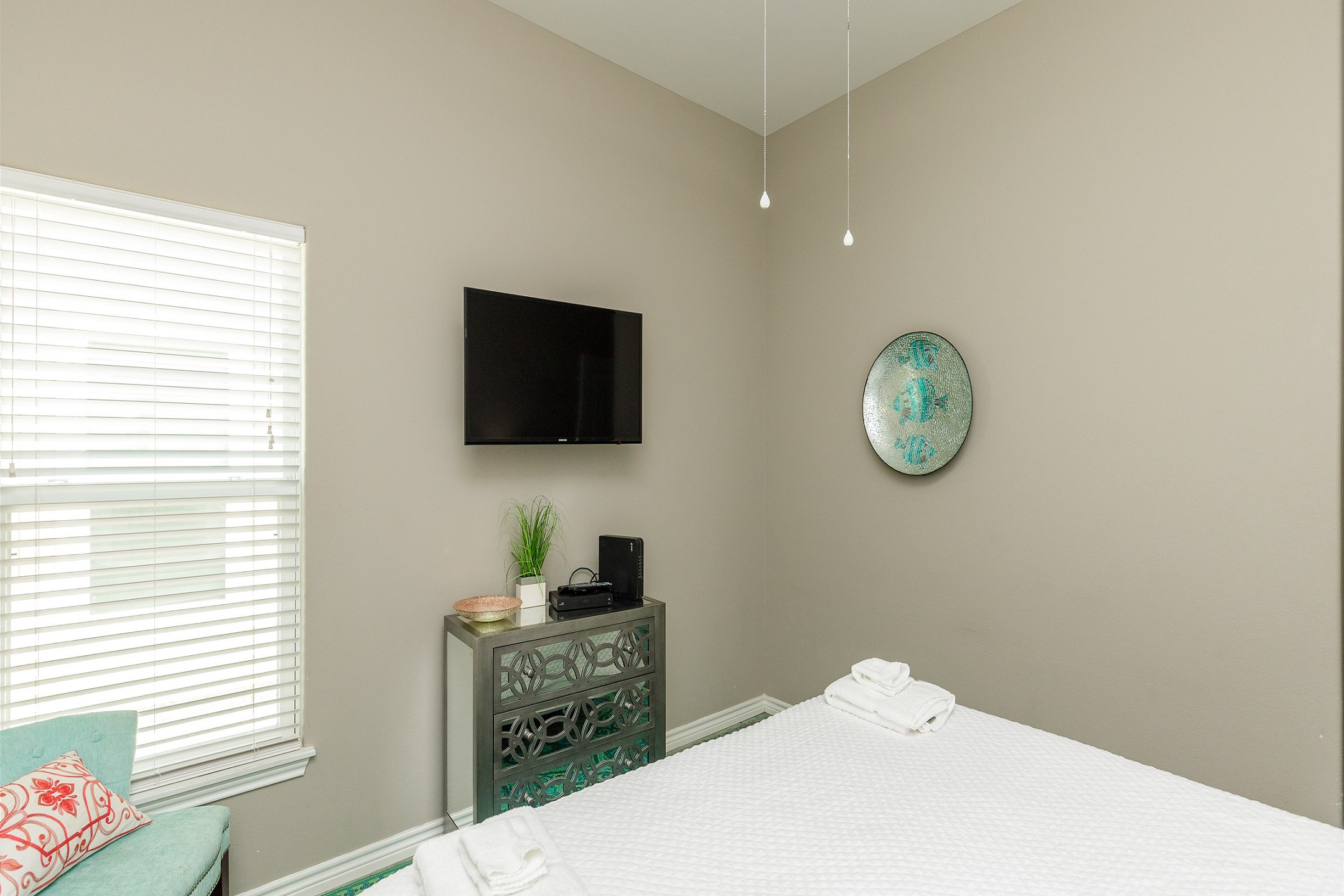 Master bedroom with king size bed, private bathroom and flat screen TV