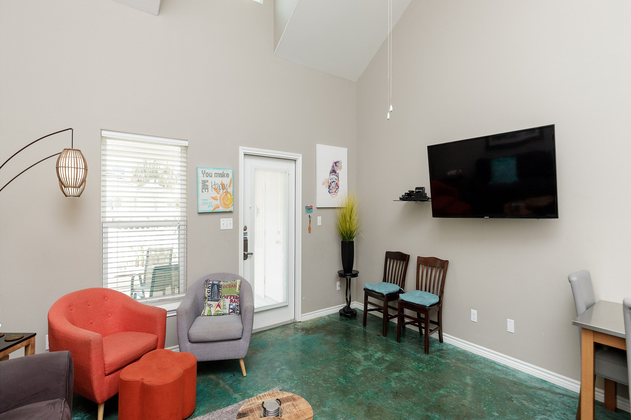 Comfortable living area featuring a queen-size sleeper sofa and a flat-screen TV for your entertainment