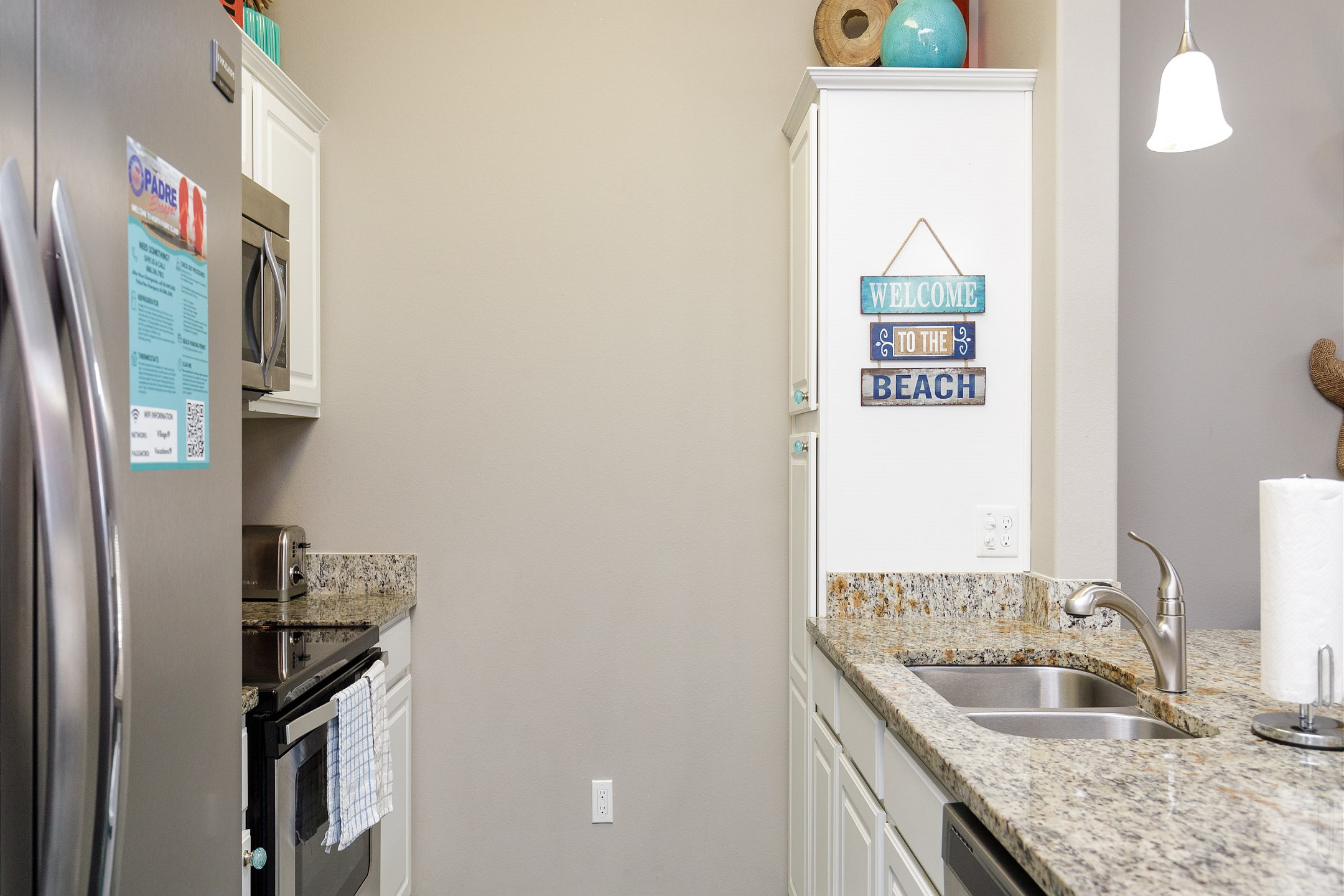 Fully equipped kitchen with coffee maker, toaster, and other essentials provided