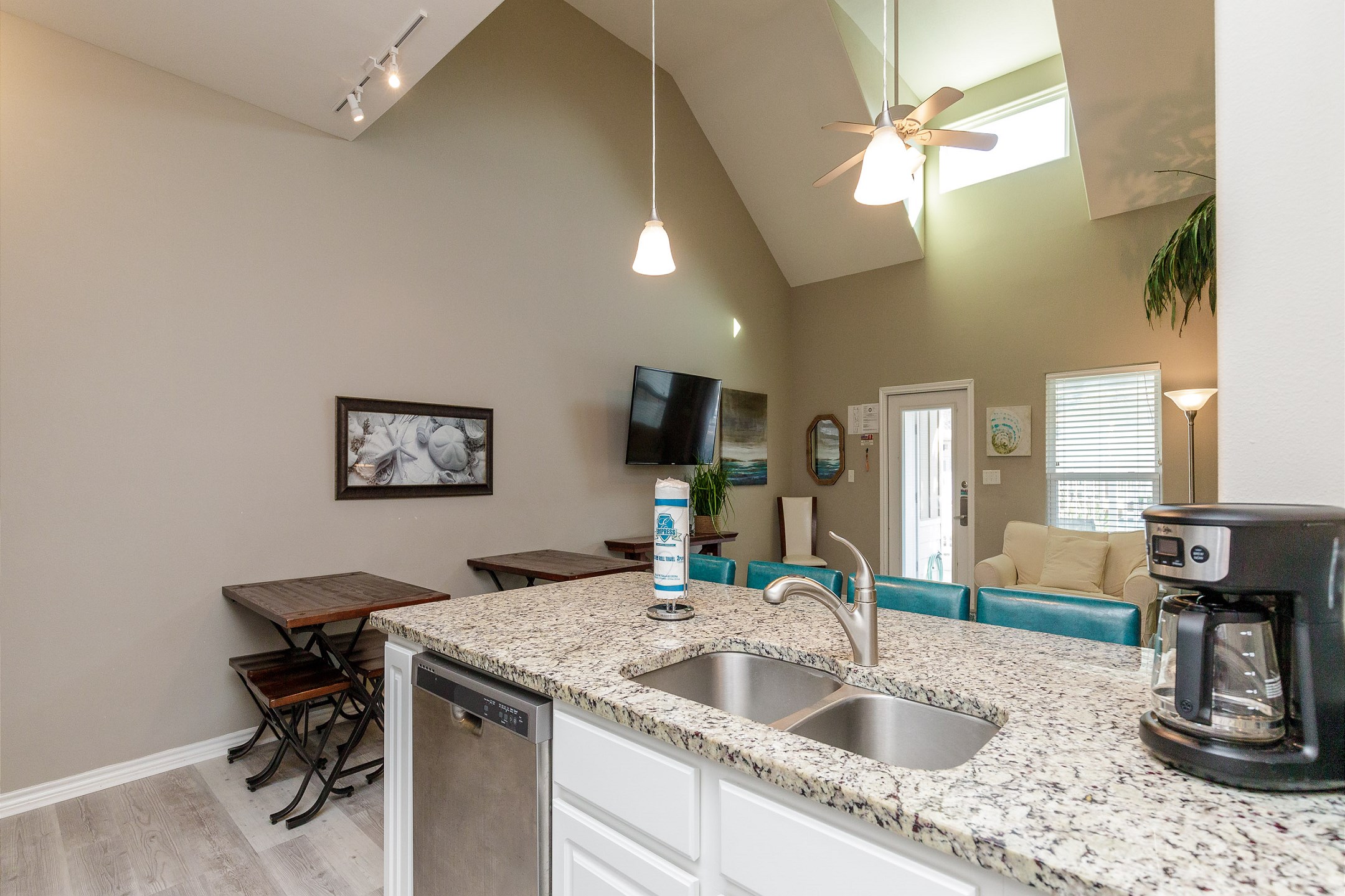 Kitchen area with beautiful counter tops and plenty of room to cook meals with the family 