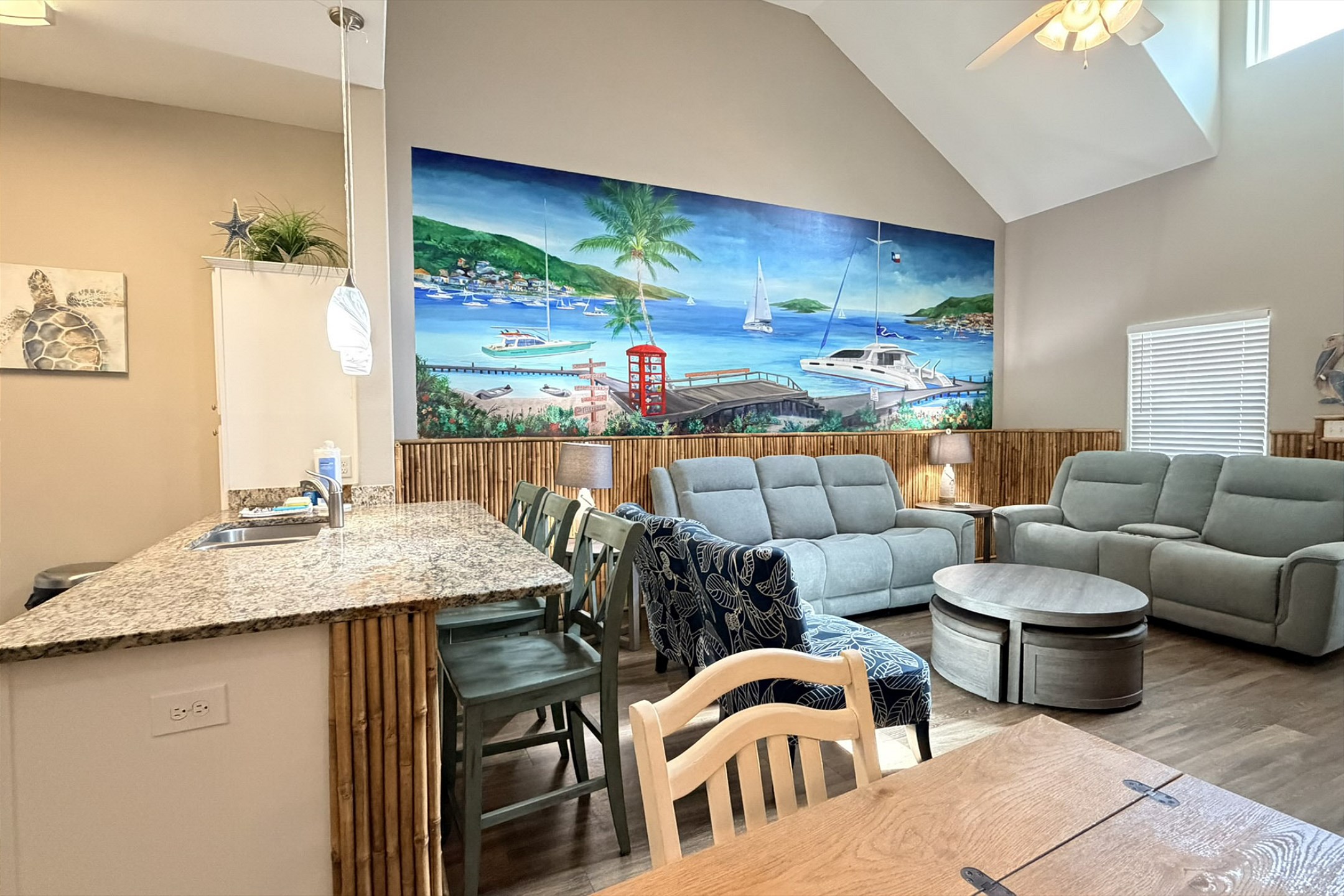 Open concept living, dining and kitchen area to spend time with family and friends