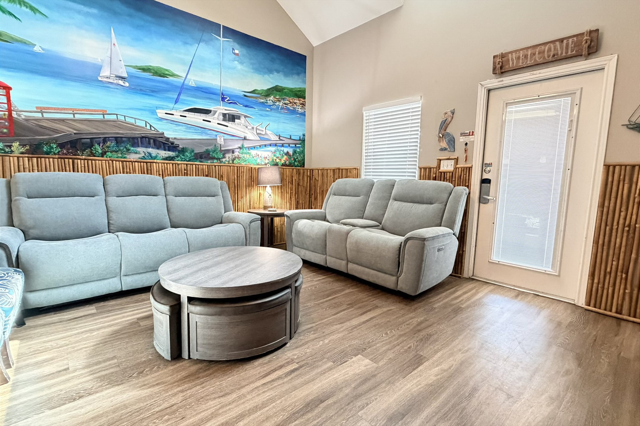 Living area with unique decor and new comfortable couch and loveseat
