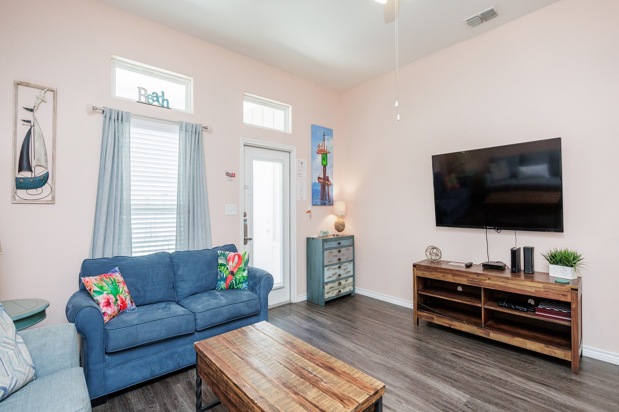 Living area with queen size sleeper sofa and flat screen TV