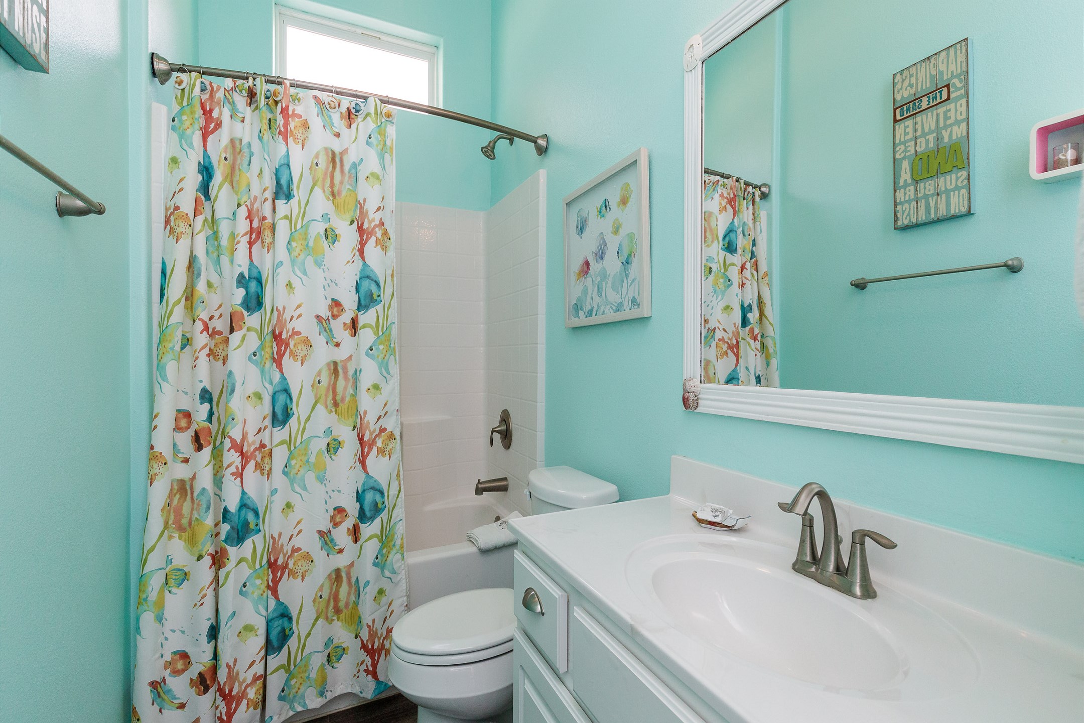 Guest bathroom with tub and shower