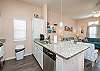 Kitchen that opens up into living area