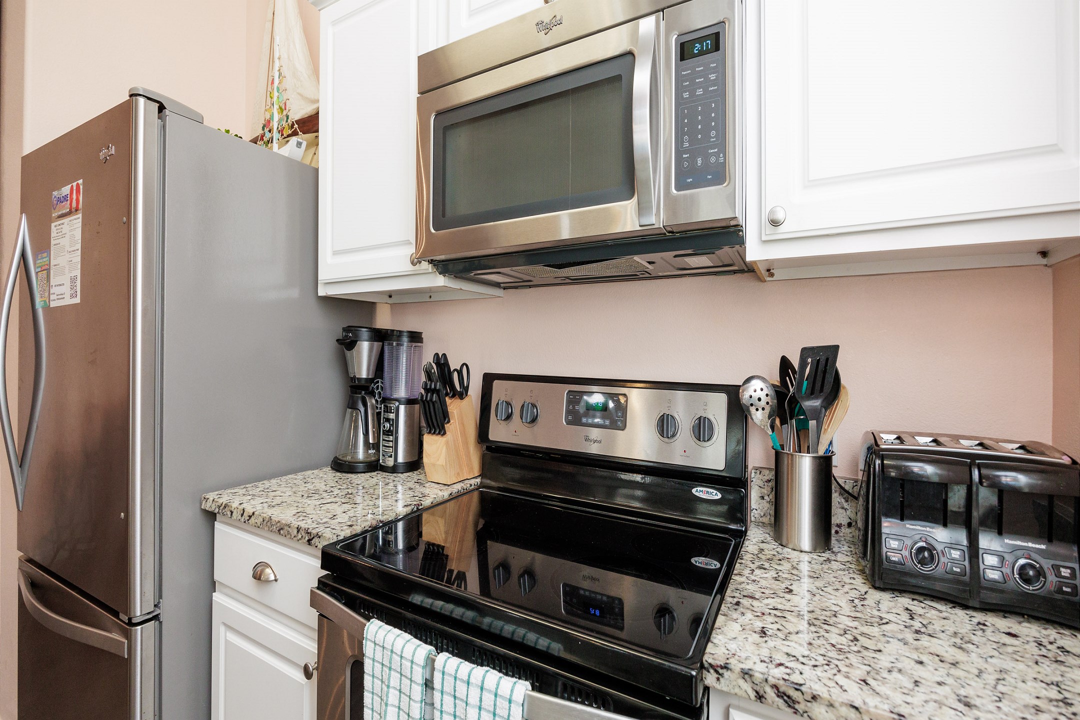 Fully equipped kitchen with stainless steel appliances 