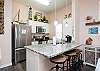 Beautiful kitchen area with barstools for entertaining 