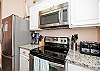 Fully equipped kitchen with stainless steel appliances 