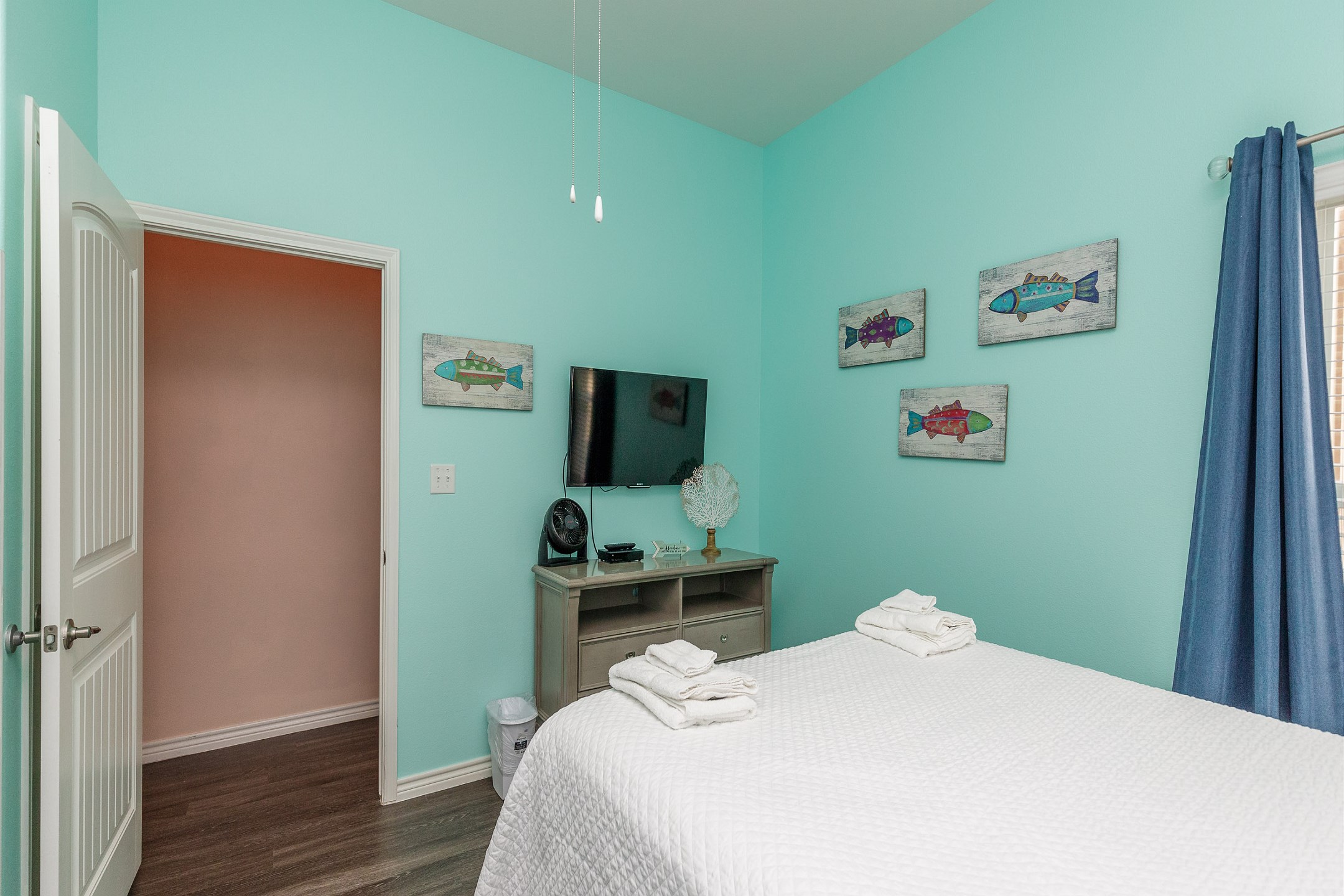 Second bedroom with queen size bed and twin size bunk beds