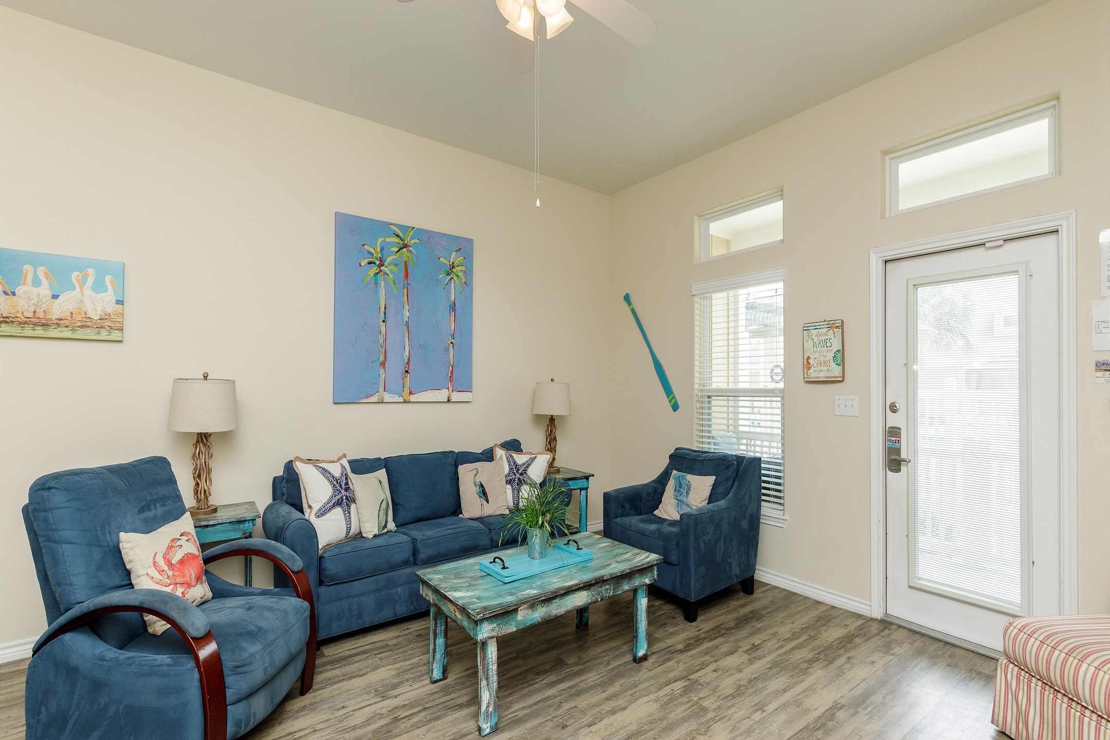 Cozy living area with a queen sleeper sofa and plenty of natural light
