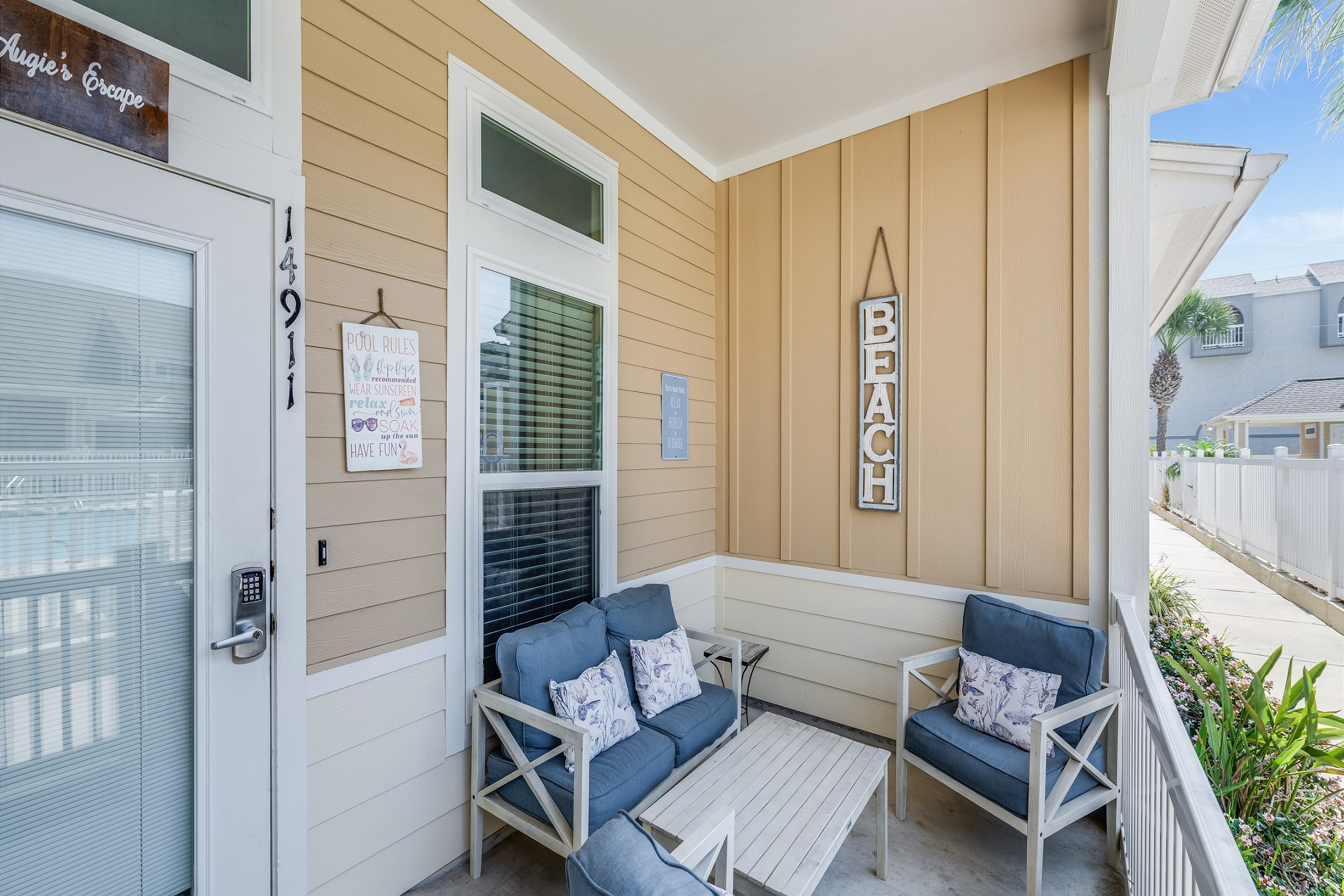 Comfy patio space—perfect for relaxing and enjoying your time between the pool and beach