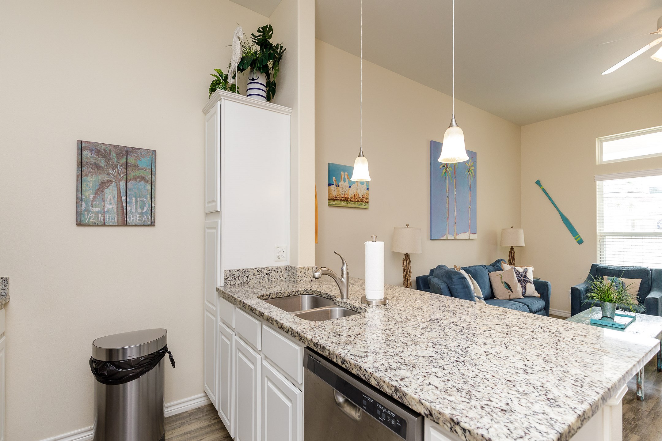 Large kitchen area with beautiful counter tops and plenty of storage