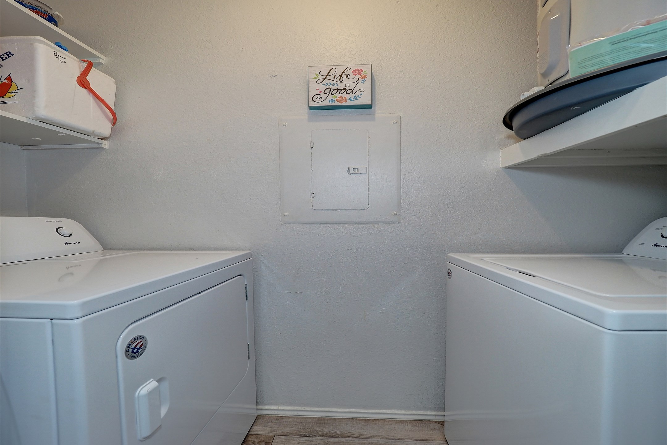 Washer and dryer in property next to kitchen