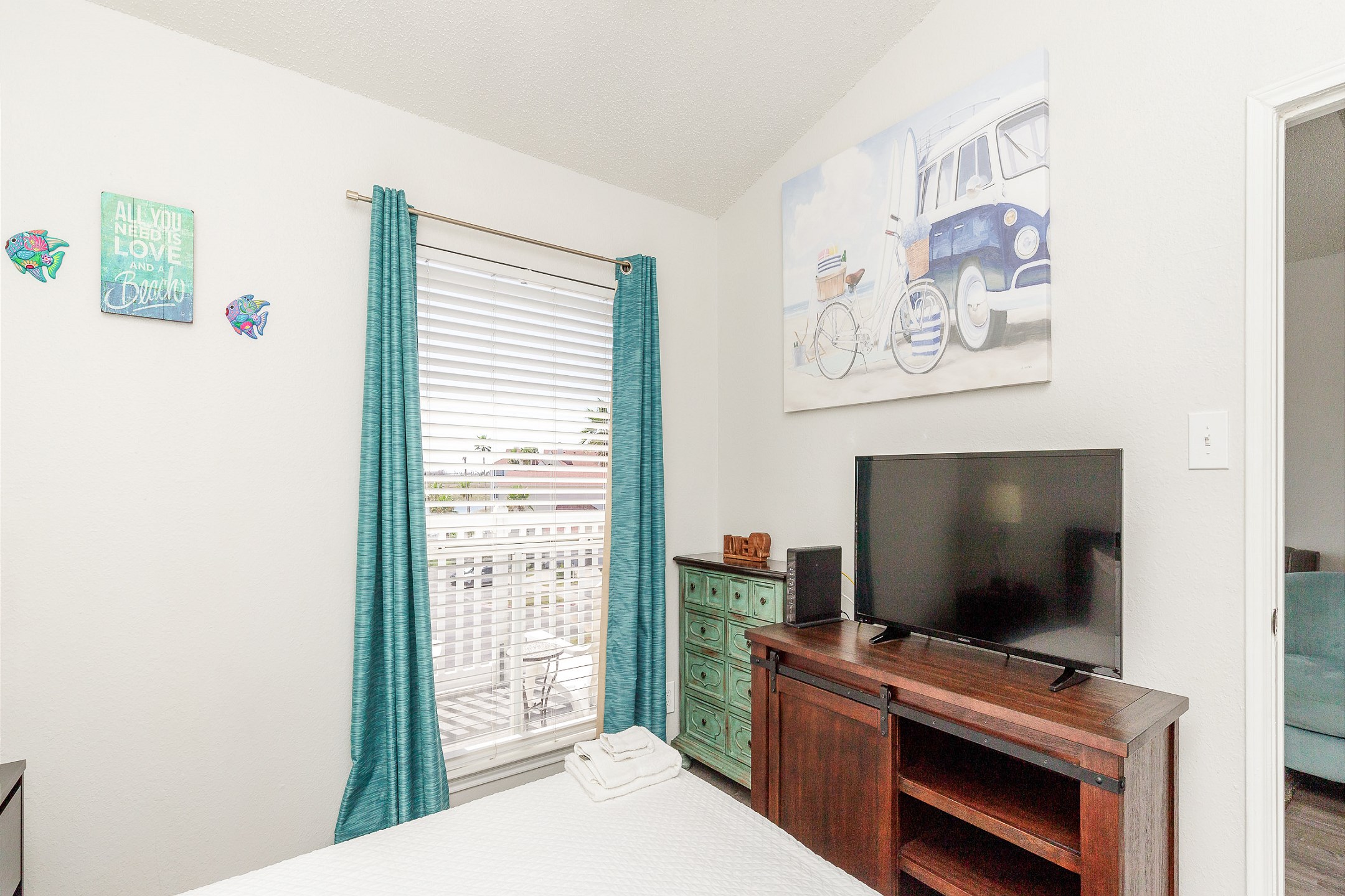 Unwind after a day of beach adventures in your peaceful queen-size haven