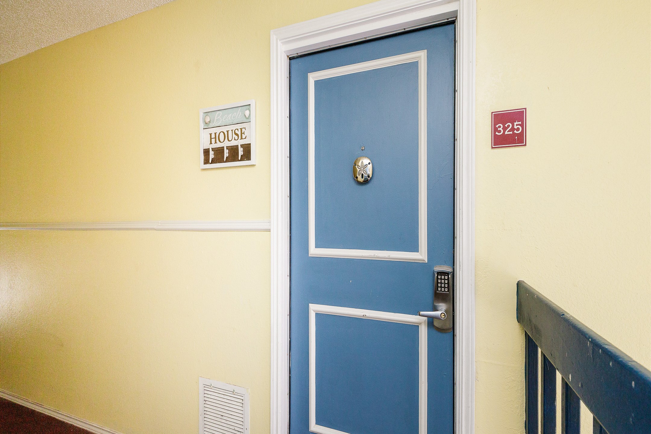 Front door entrance to condo 325