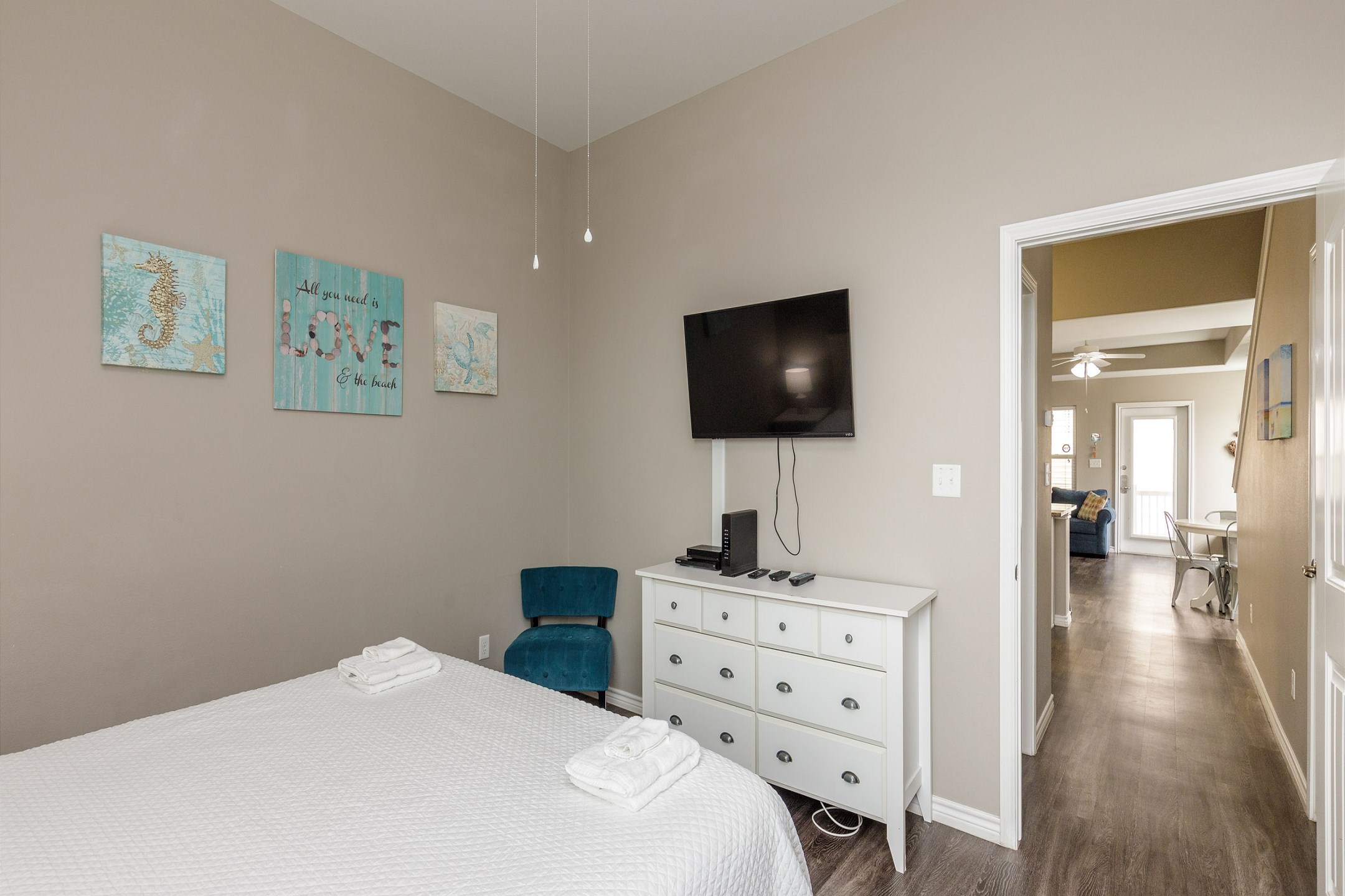 Master bedroom on the first floor with king size bed and flat screen TV
