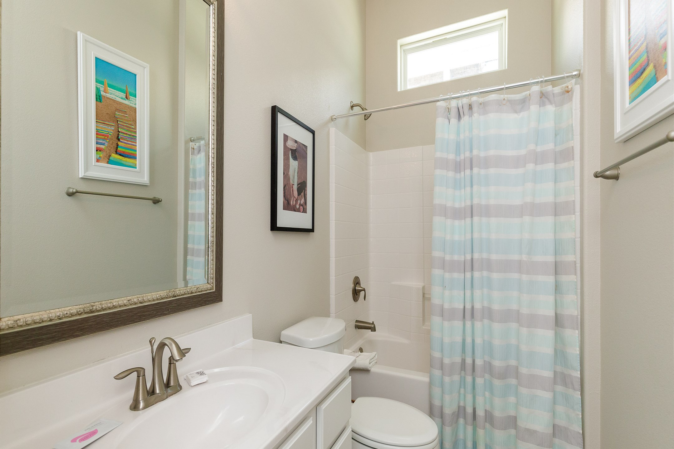 Guest bathroom with tub and shower combo