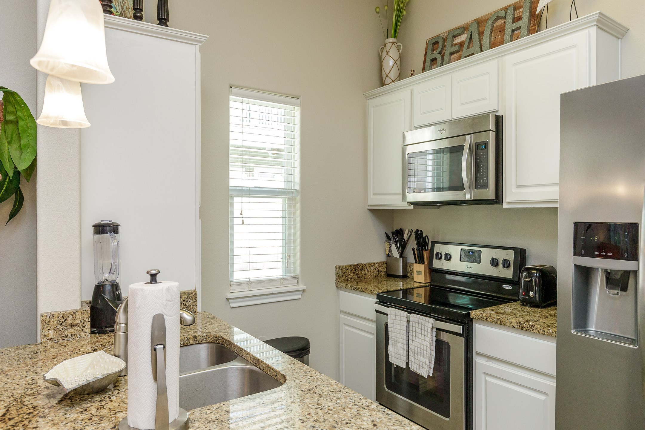 Beautiful kitchen space with all the essentials you need and plenty of counter space to cook meals with the family 