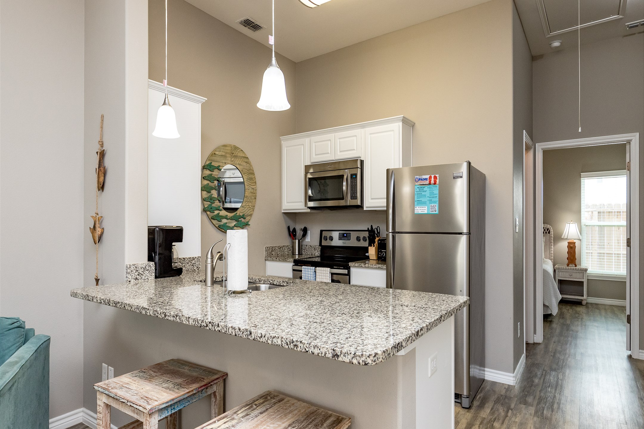 Beautiful kitchen and island breakfast bar for casual dining