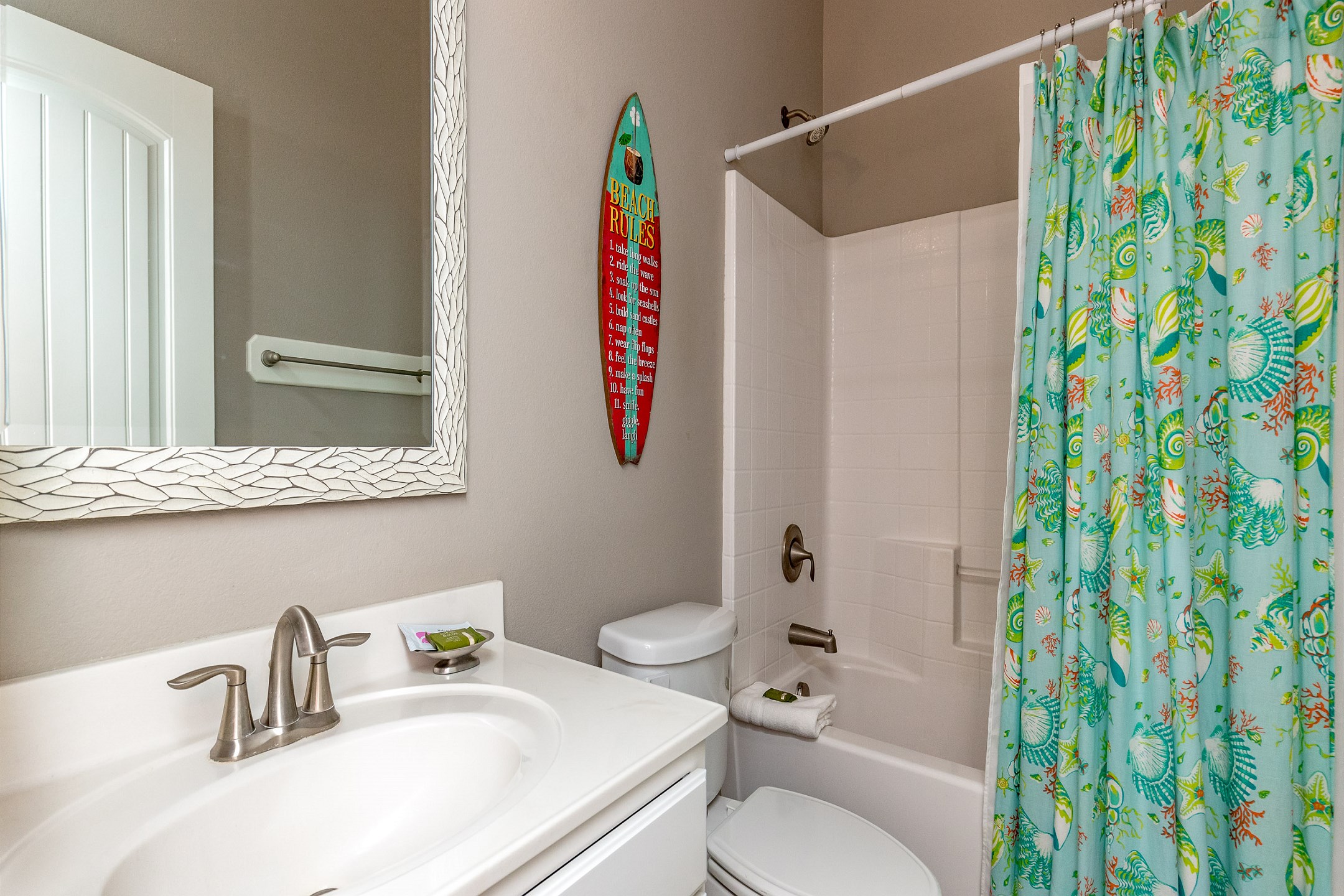 Guest bathroom with tub and shower