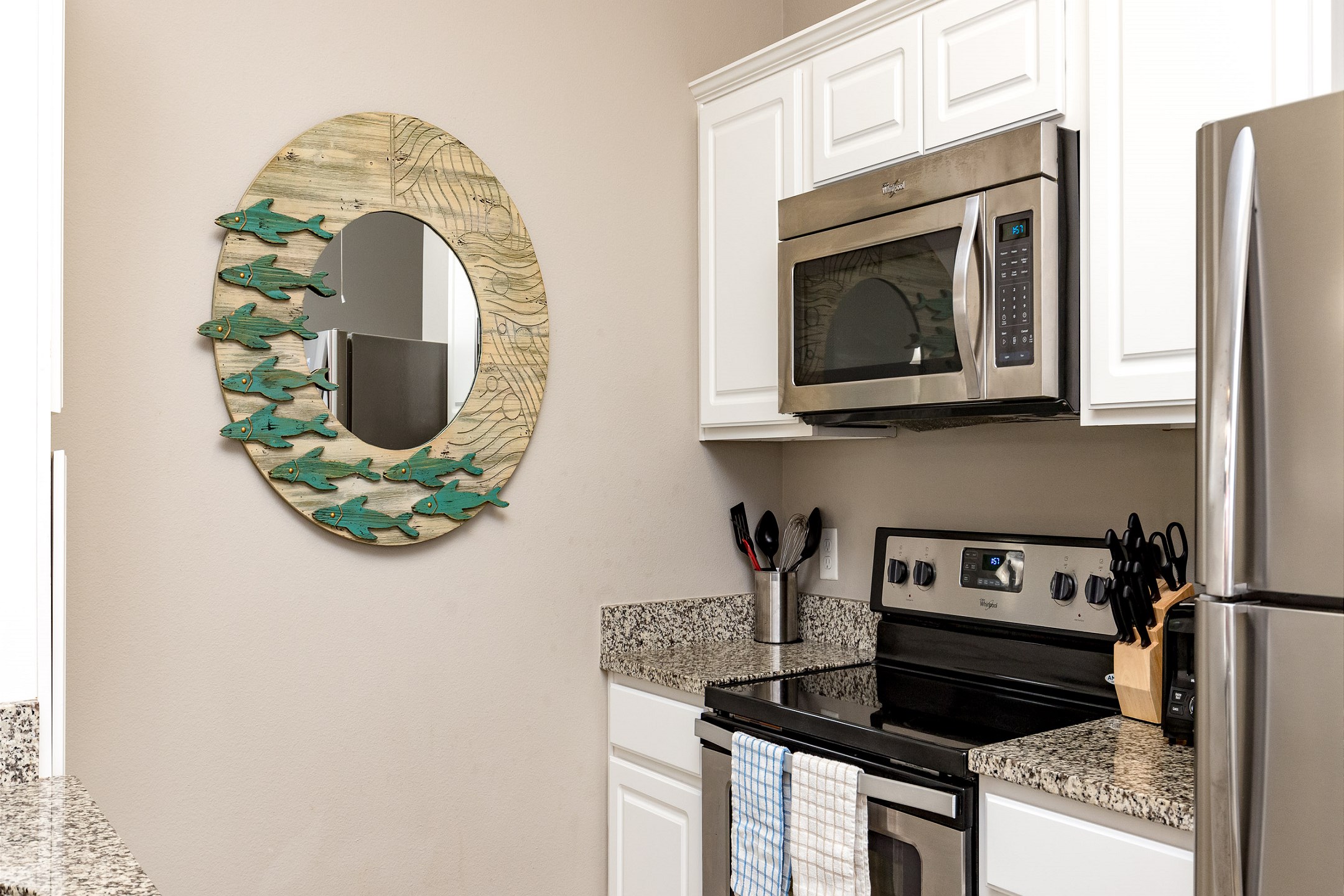 Fully equipped kitchen with stainless steel appliances 