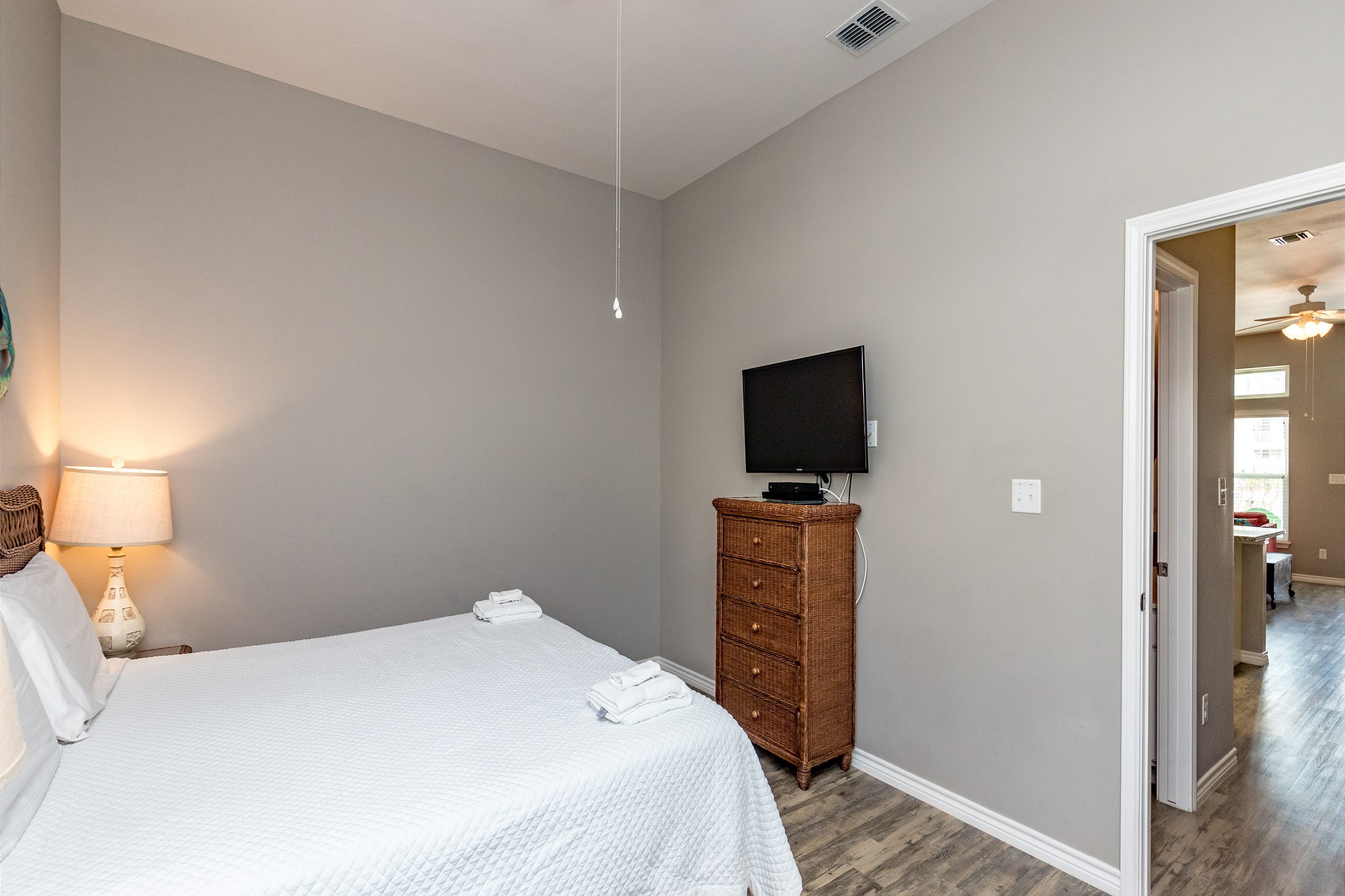 Master bedroom with king size bed and flat screen TV