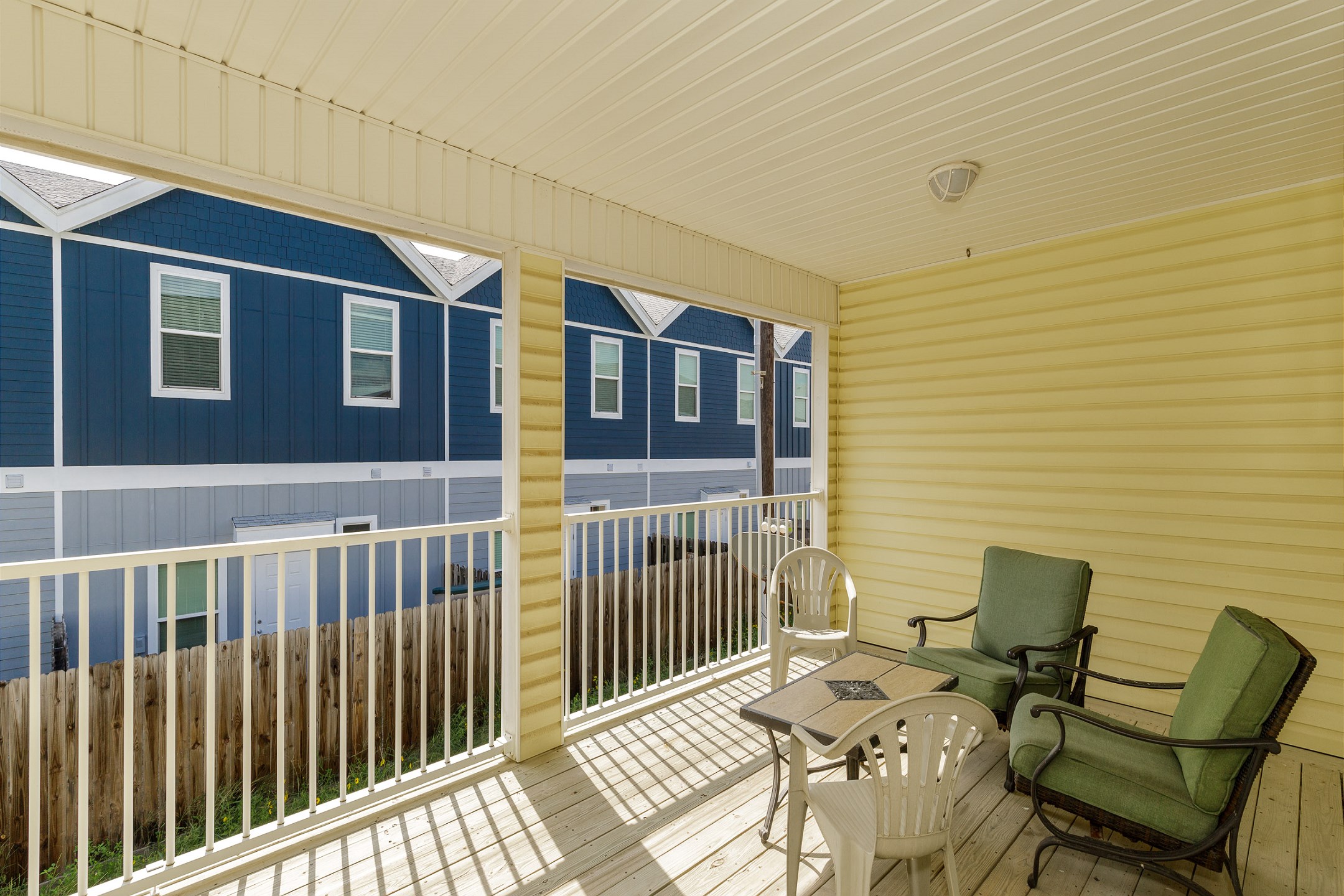 Large private patio on the second floor with comfy seating 