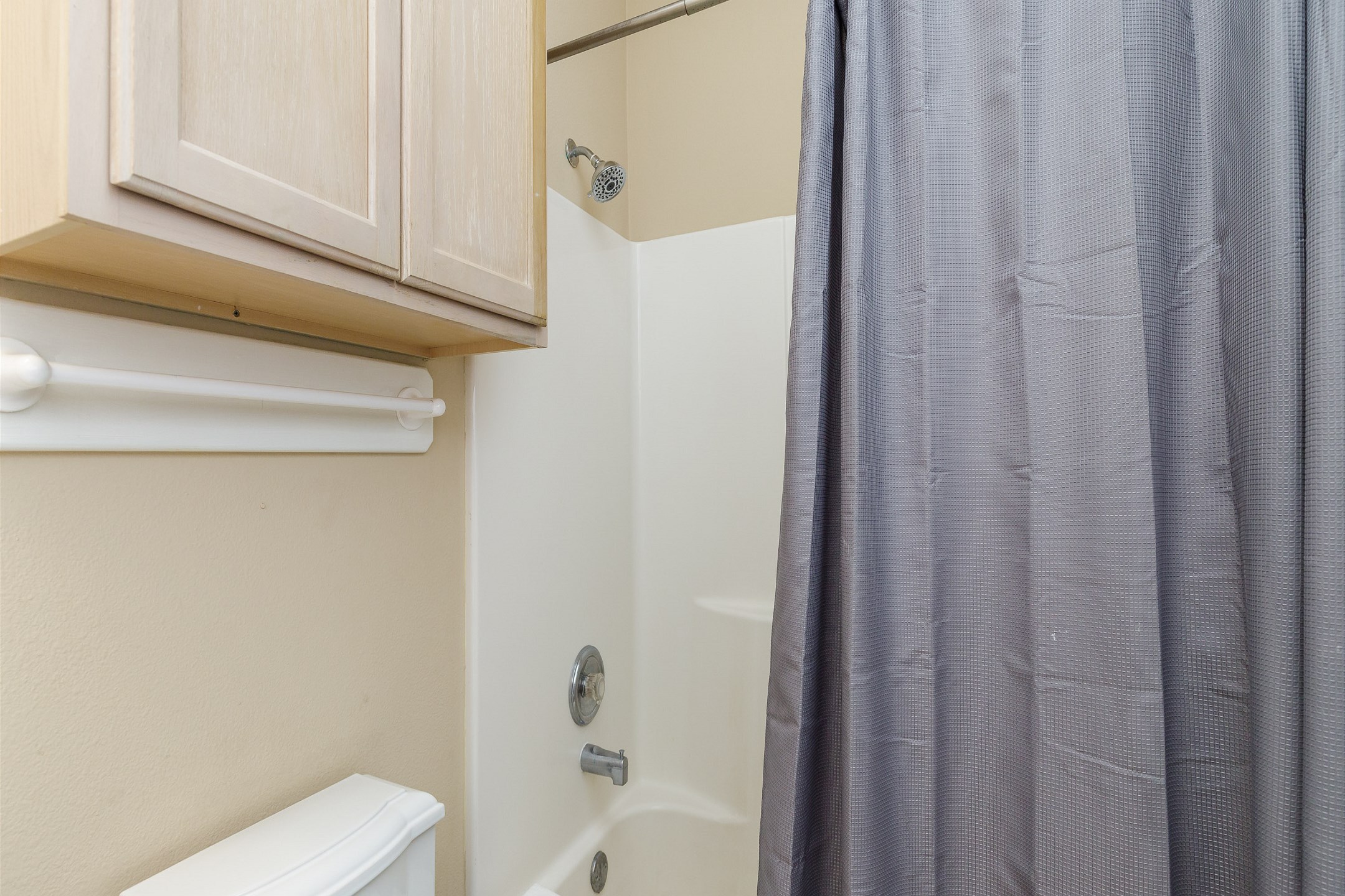 Guest bathroom on the second floor with tub and shower