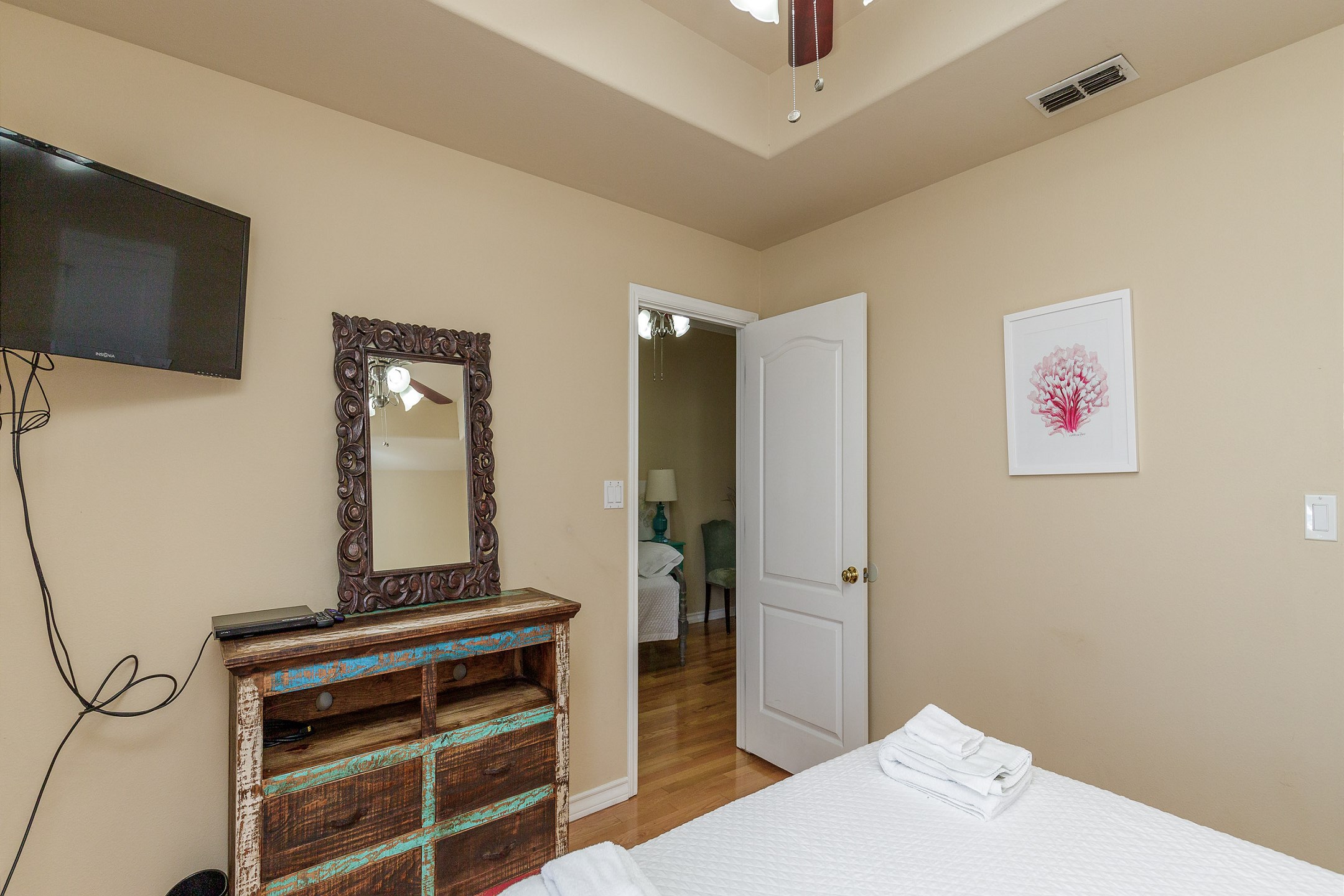 Third bedroom on the second floor with queen size bed and flat screen TV