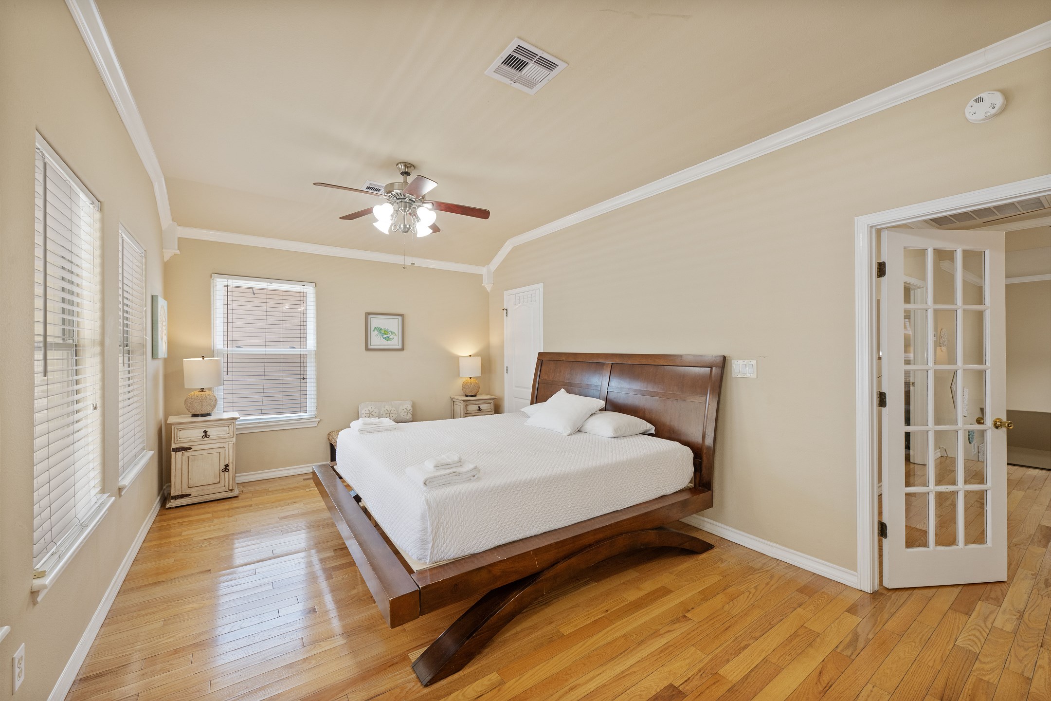 Second bedroom on second floor with king size bed, full size futon, private balcony and flat screen TV