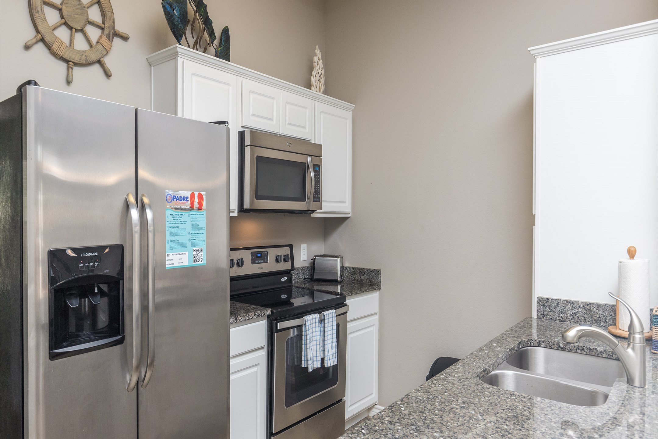 Modern kitchen with stainless steel appliances