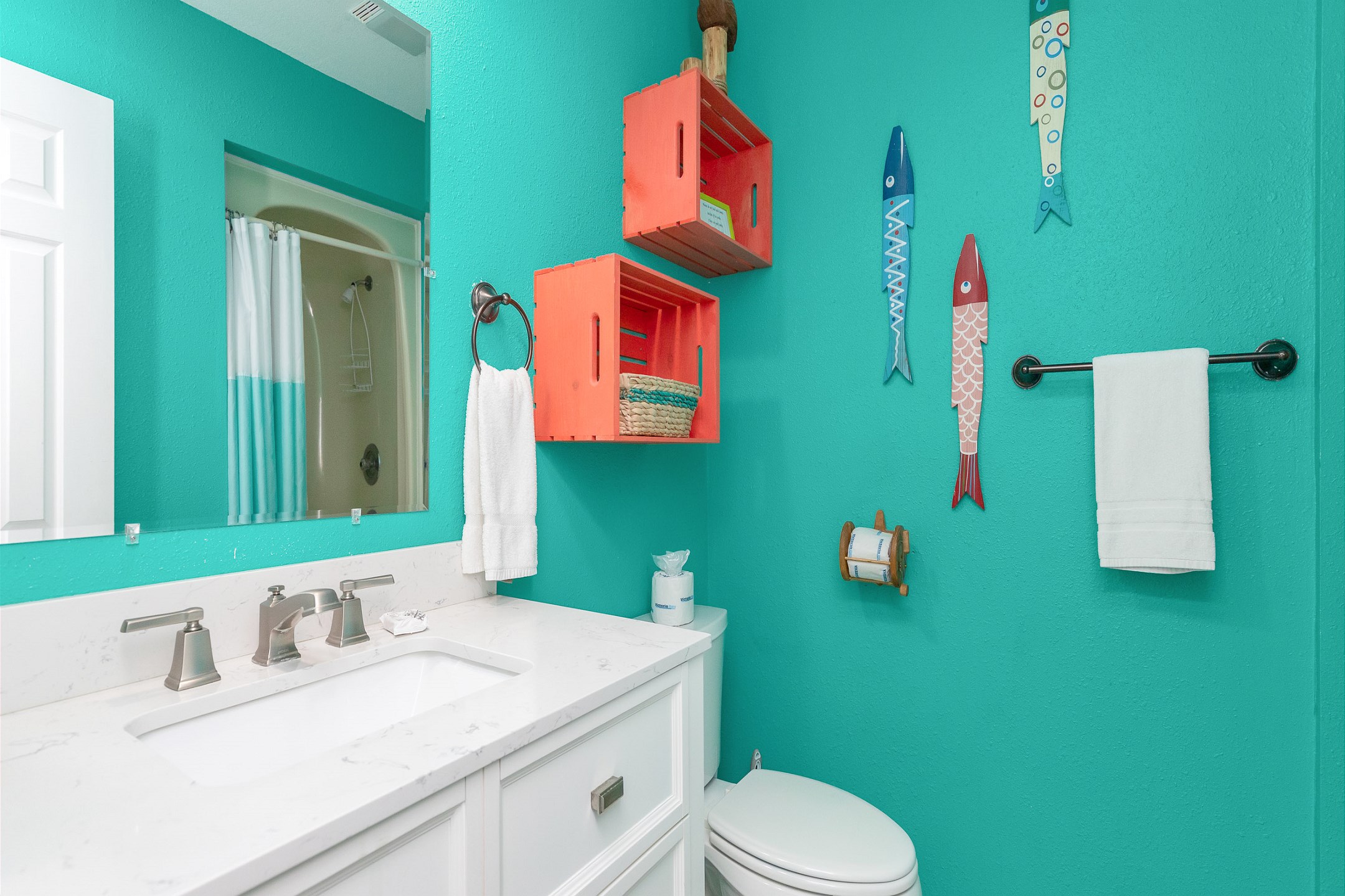 Guest bathroom with tub and shower 