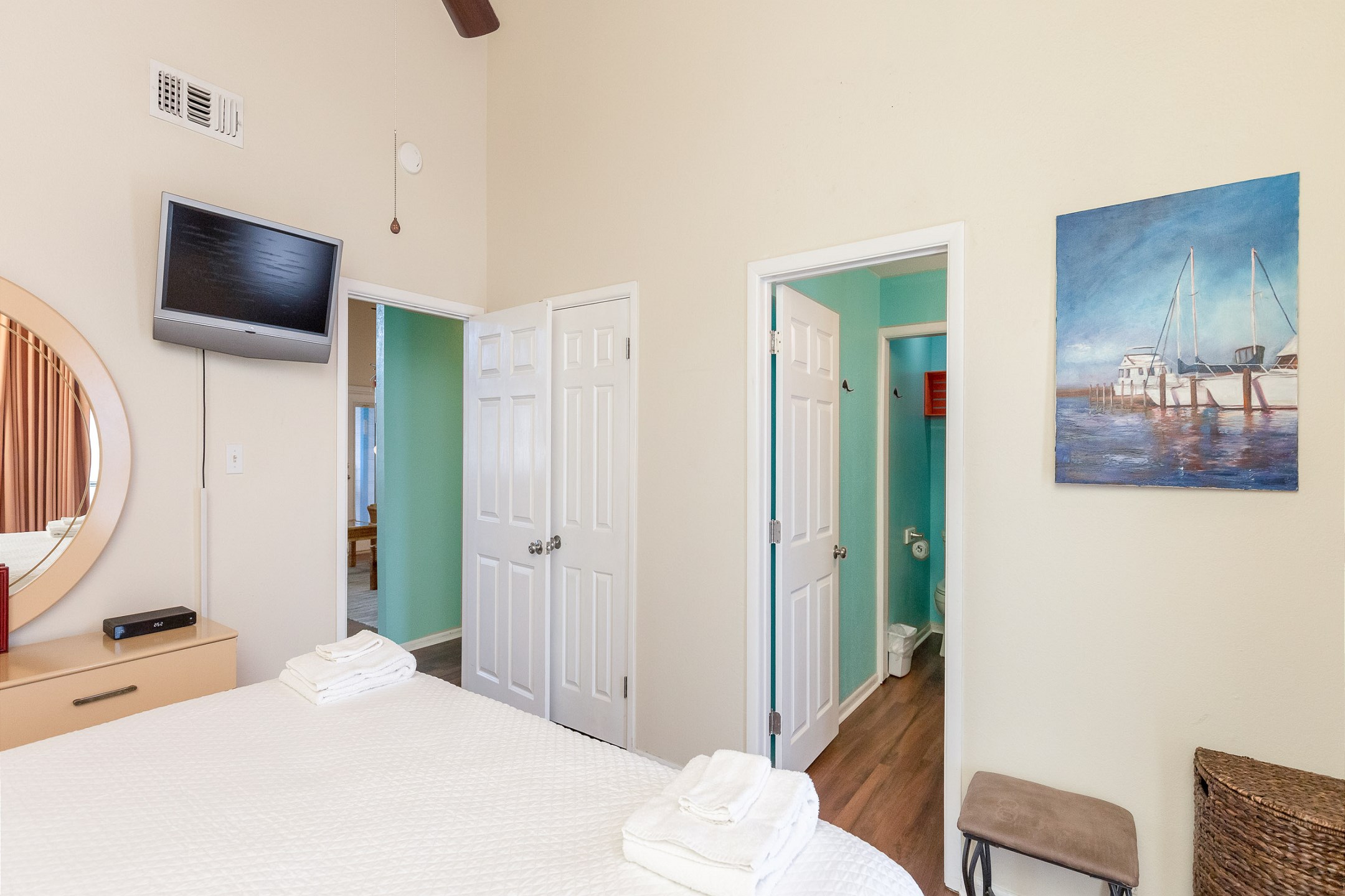 Master bedroom with king size bed, private bathroom and flat screen TV