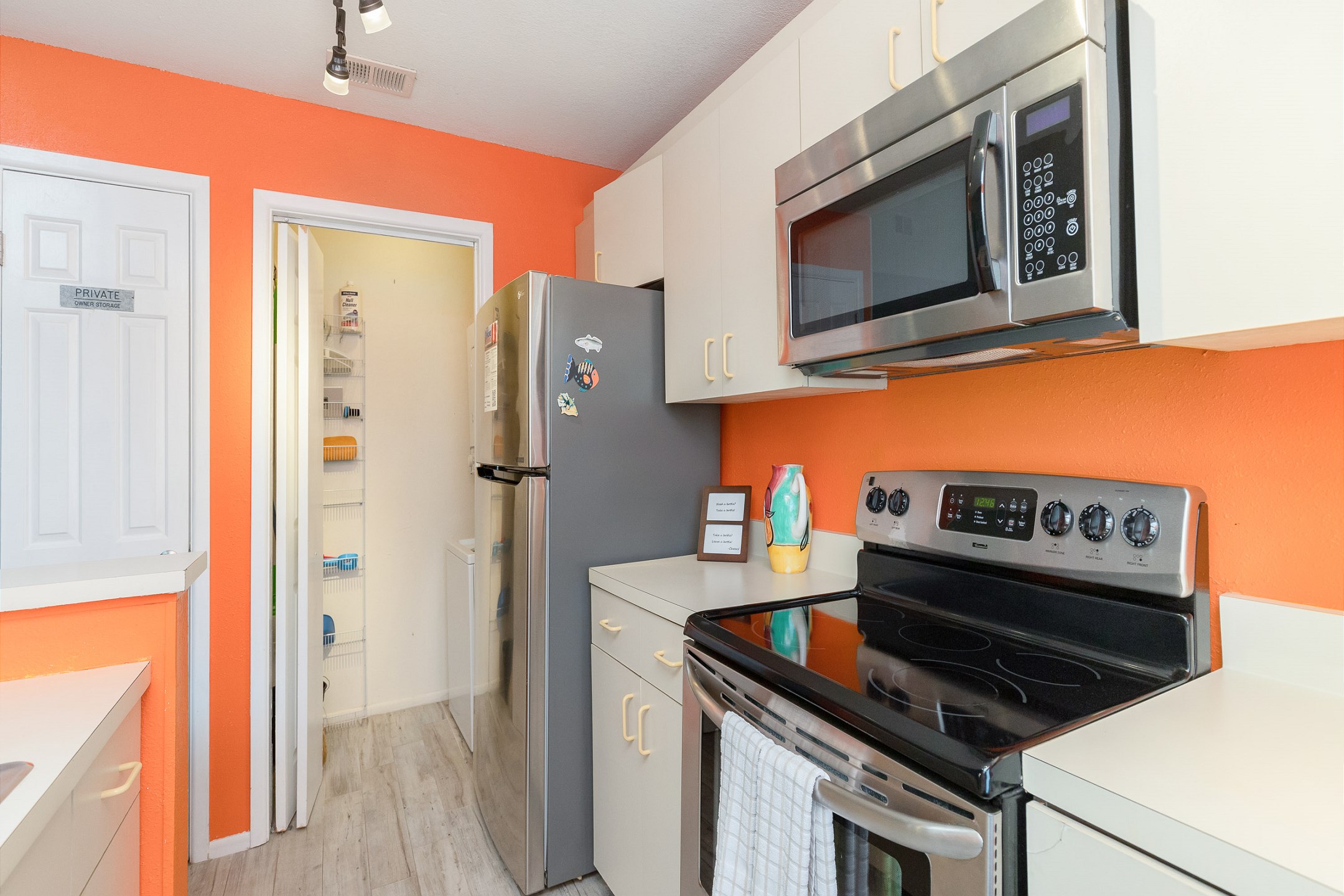 Fully equipped kitchen with stainless steel appliances 