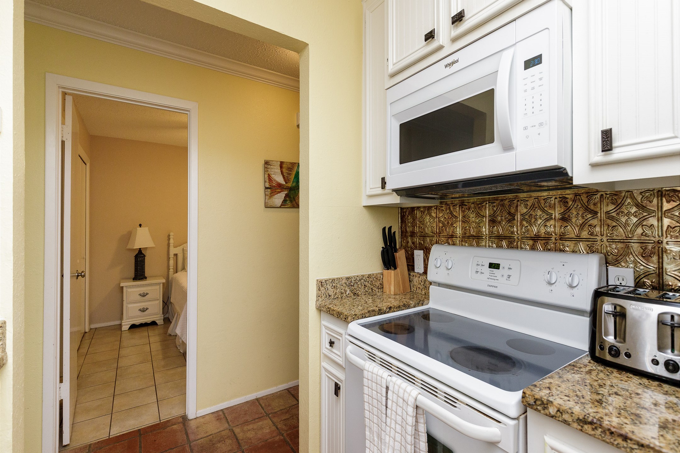 Kitchen area with plenty of storage