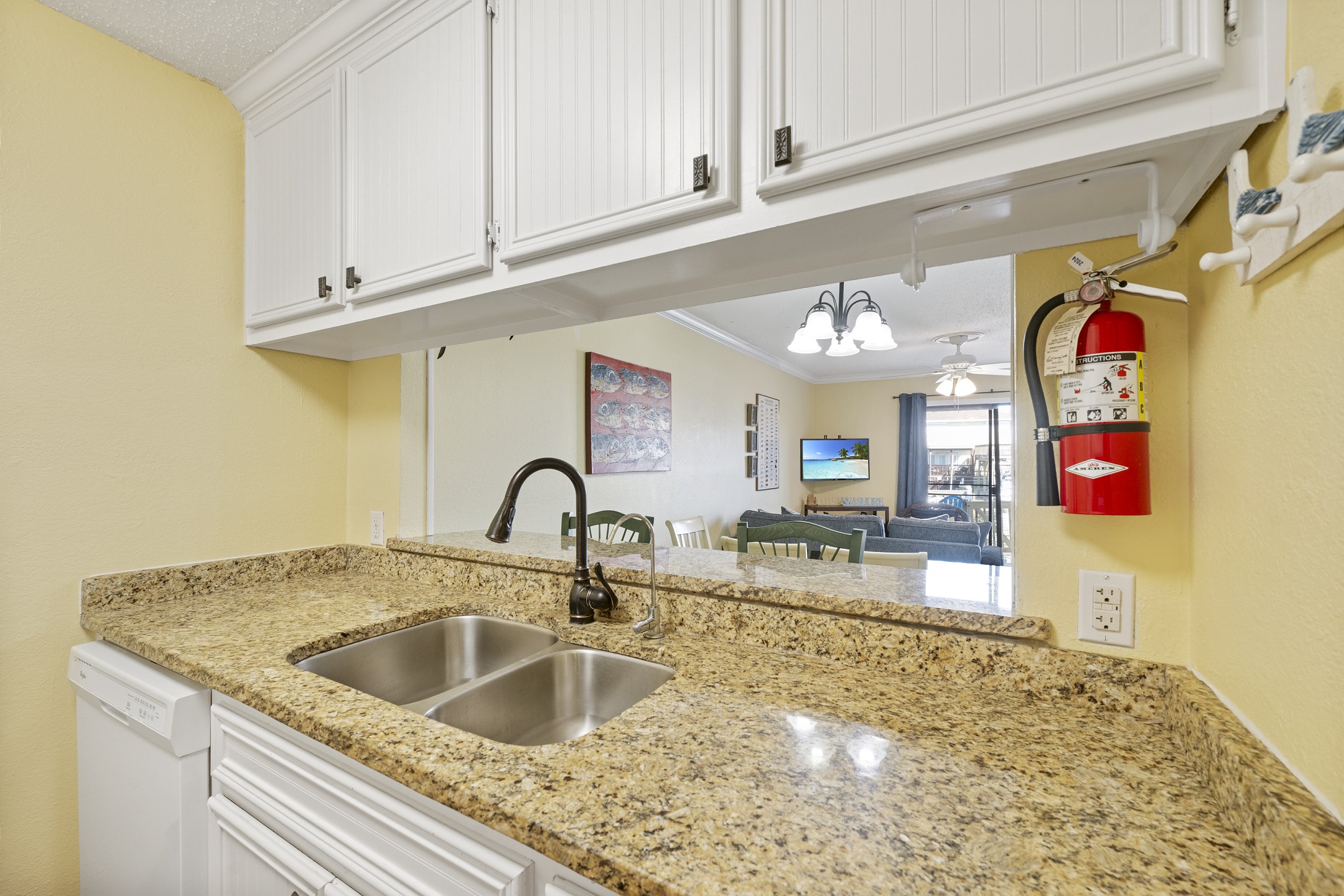 Kitchen area with a 12 cup coffee maker