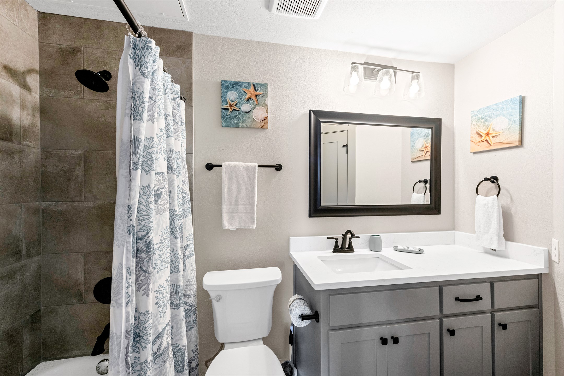 Wash the day away in this remodeled guest bathroom with a walk in shower