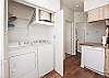 Convenient washer and dryer located in the kitchen for easy access during your stay
