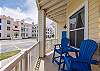 A cozy back patio area, ideal for relaxing or enjoying a meal outdoors